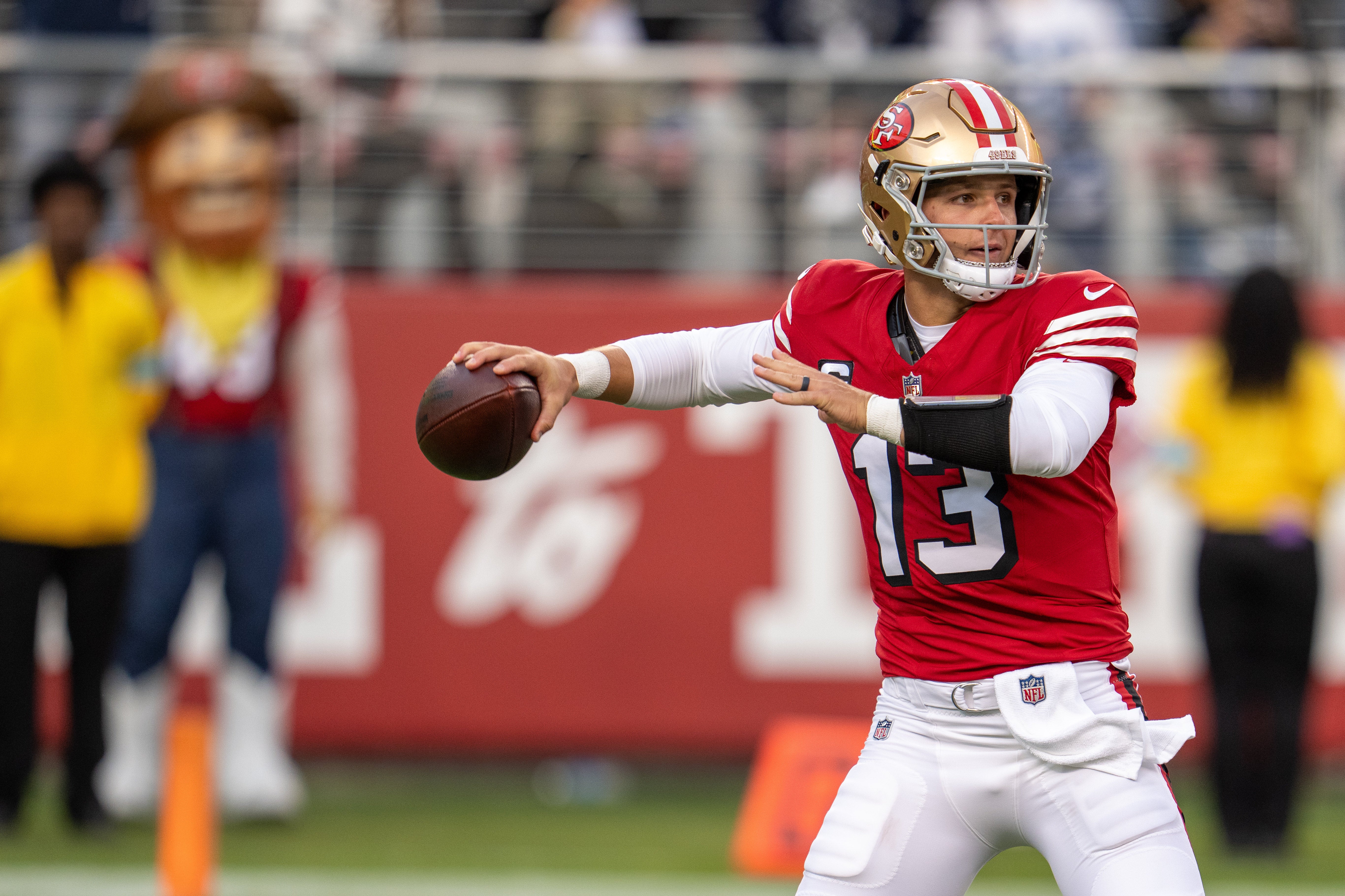 San Francisco 49ers quarterback Brock Purdy (13) prepares to pass against the Dallas Cowboys during the first quarter at Levi's Stadium.