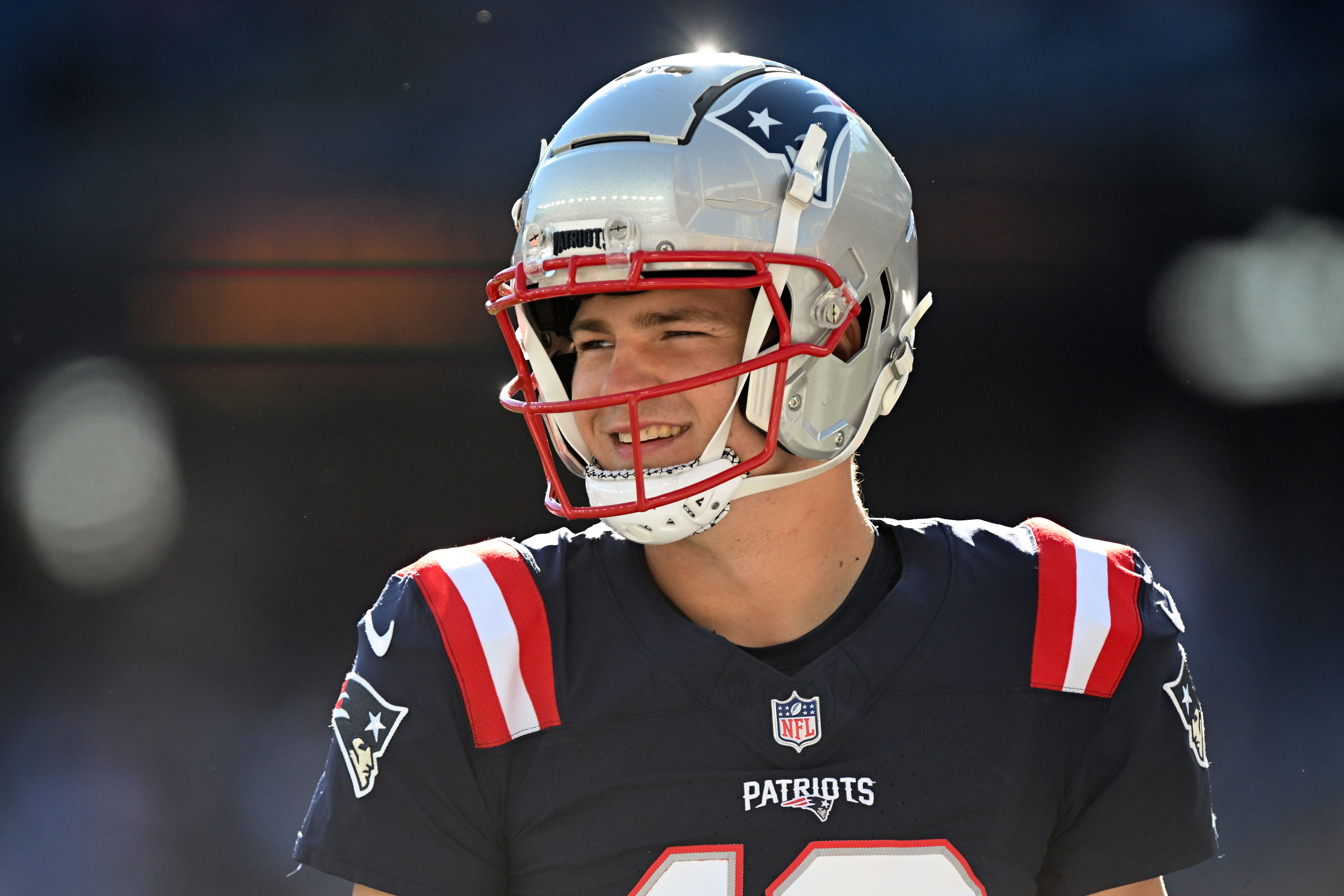 Nov 17, 2024; Foxborough, Massachusetts, USA; New England Patriots quarterback Drake Maye (10) walks onto the field before a game against the Los Angeles Rams at Gillette Stadium.