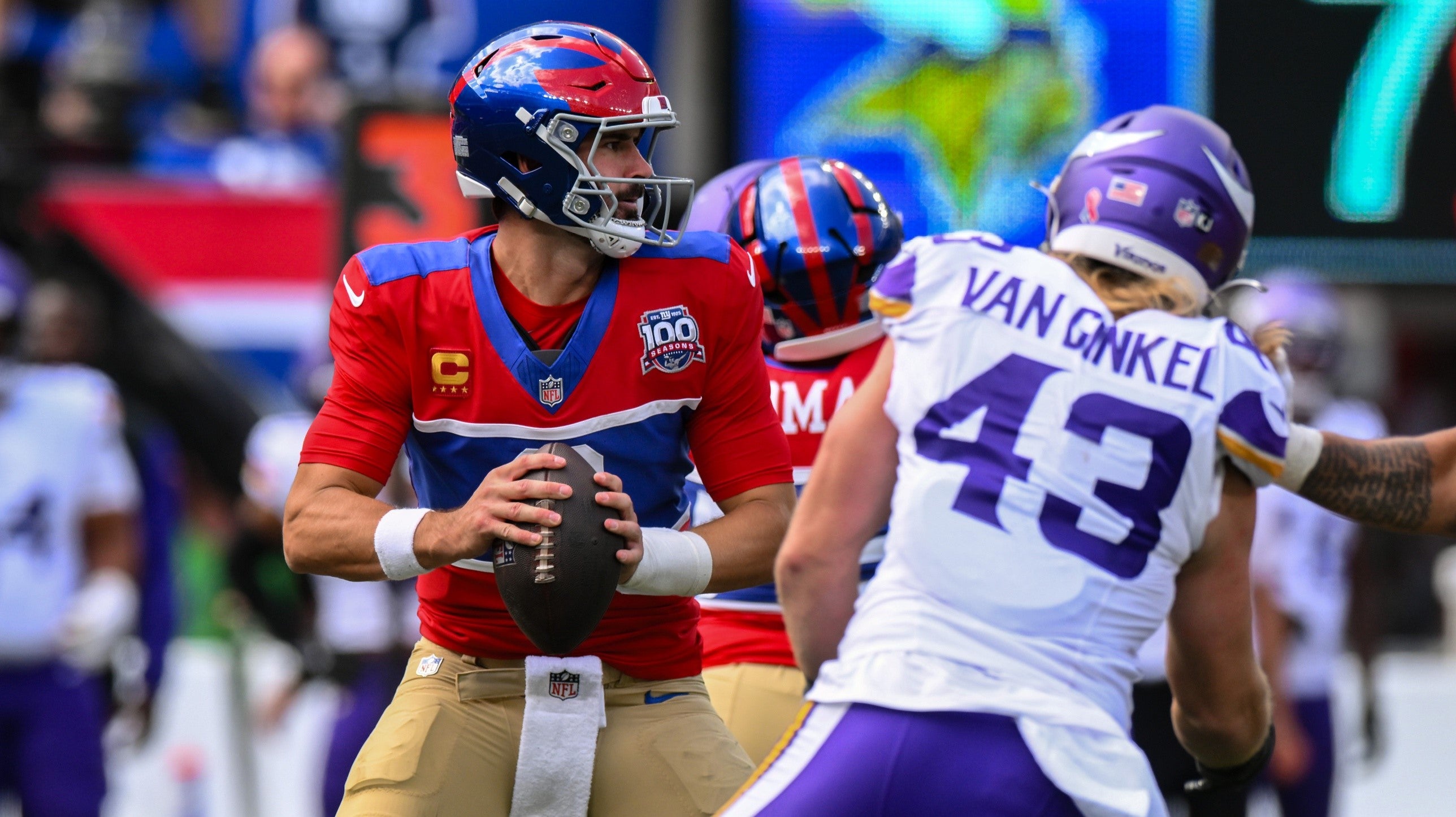 Sep 8, 2024; East Rutherford, New Jersey, USA; New York Giants quarterback Daniel Jones (8) drops back to pass as Minnesota Vikings linebacker Andrew Van Ginkel (43) applies pressure during the first half at MetLife Stadium.