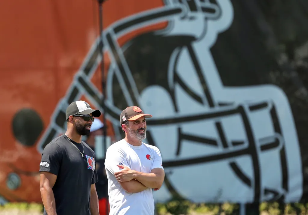 Browns general manager Andrew Berry, left, and head coach Kevin Stefanski watch practice during minicamp, Thursday, June 13, 2024, in Berea