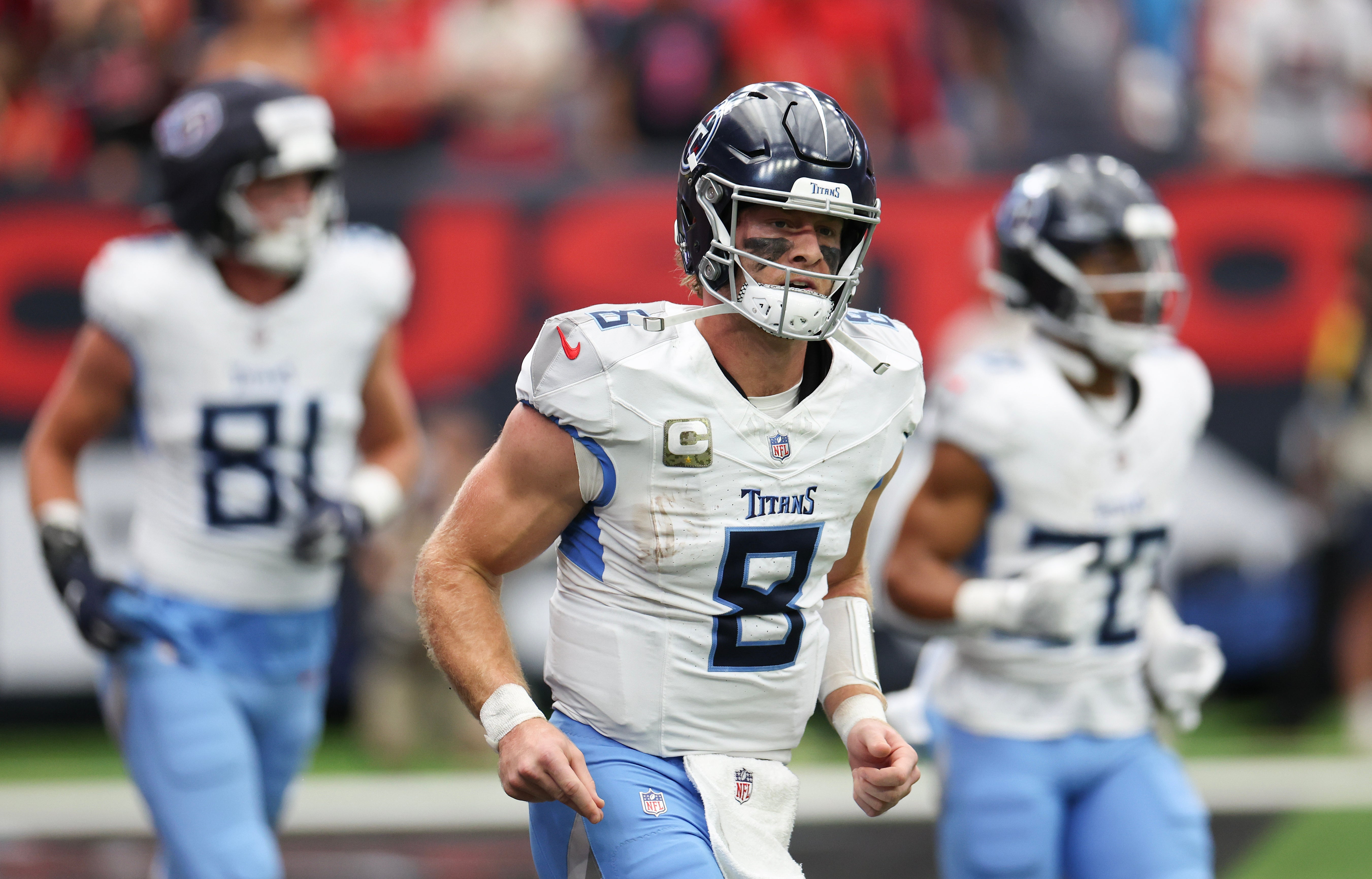 Tennessee Titans quarterback Will Levis (8) runs off the field after throwing a touchdown pass against the Houston Texans in the first quarter at NRG Stadium. Thomas Shea-Imagn Images