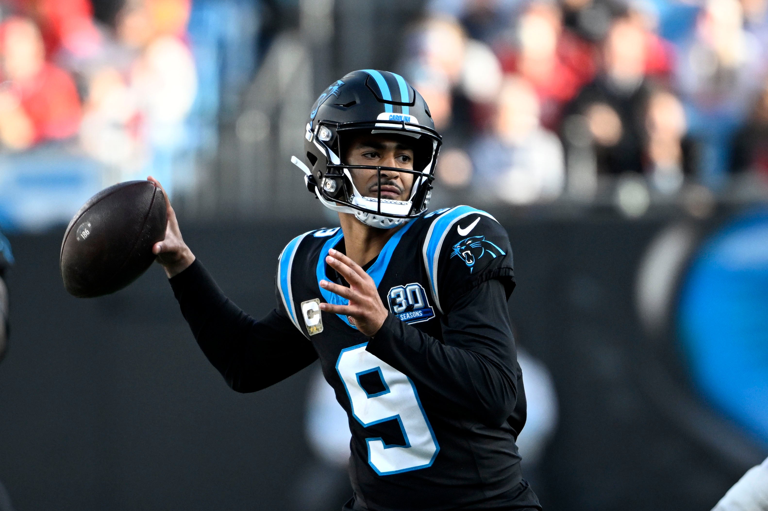 Nov 24, 2024; Charlotte, North Carolina, USA; Carolina Panthers quarterback Bryce Young (9) looks to pass in the third quarter at Bank of America Stadium.