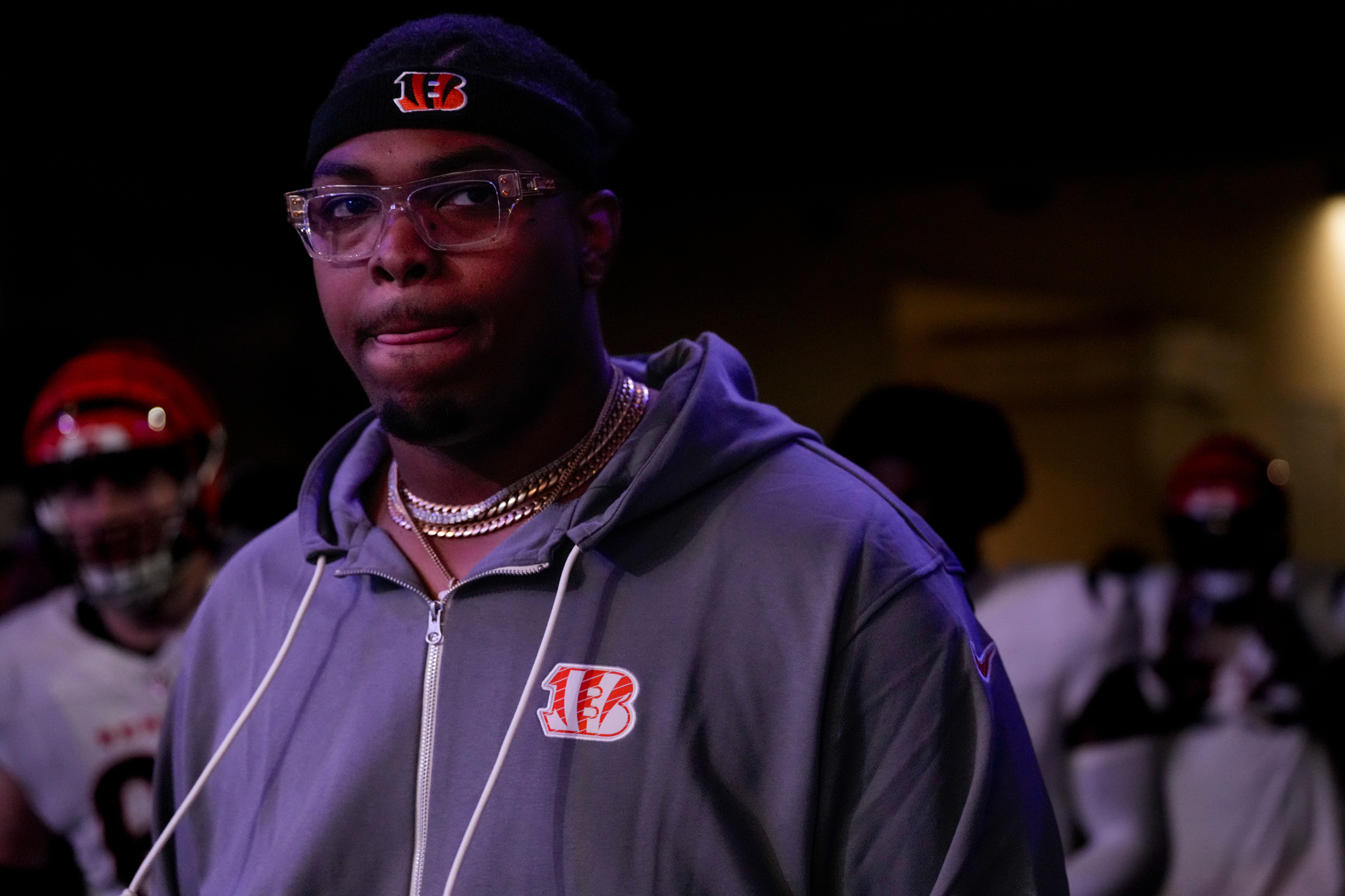 Injured Cincinnati Bengals offensive tackle Orlando Brown Jr. (75) walks on the field in the first quarter of the NFL Week 11 game between the Los Angeles Chargers and the Cincinnati Bengals at SoFi Stadium in Inglewood, Calif., on Sunday, Nov. 17, 2024. The Chargers led 24-6 at halftime.