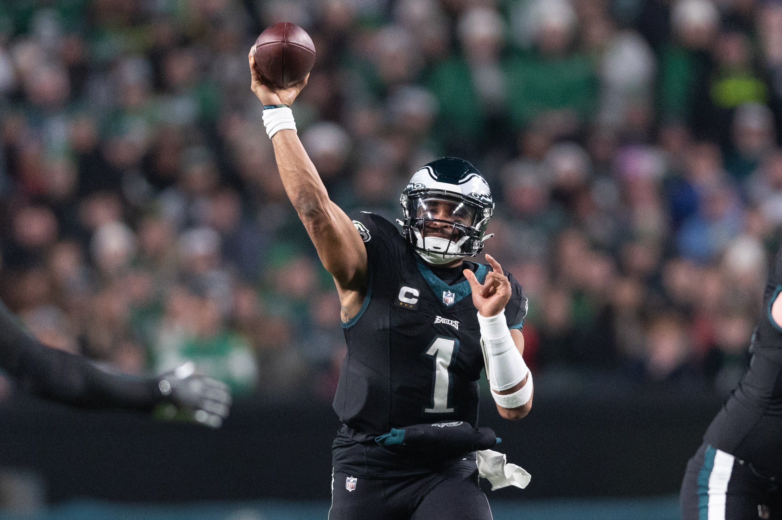 Philadelphia Eagles quarterback Jalen Hurts (1) throws a touchdown pass to wide receiver DeVonta Smith (not pictured) during the second quarter against the New York Giants at Lincoln Financial Field.