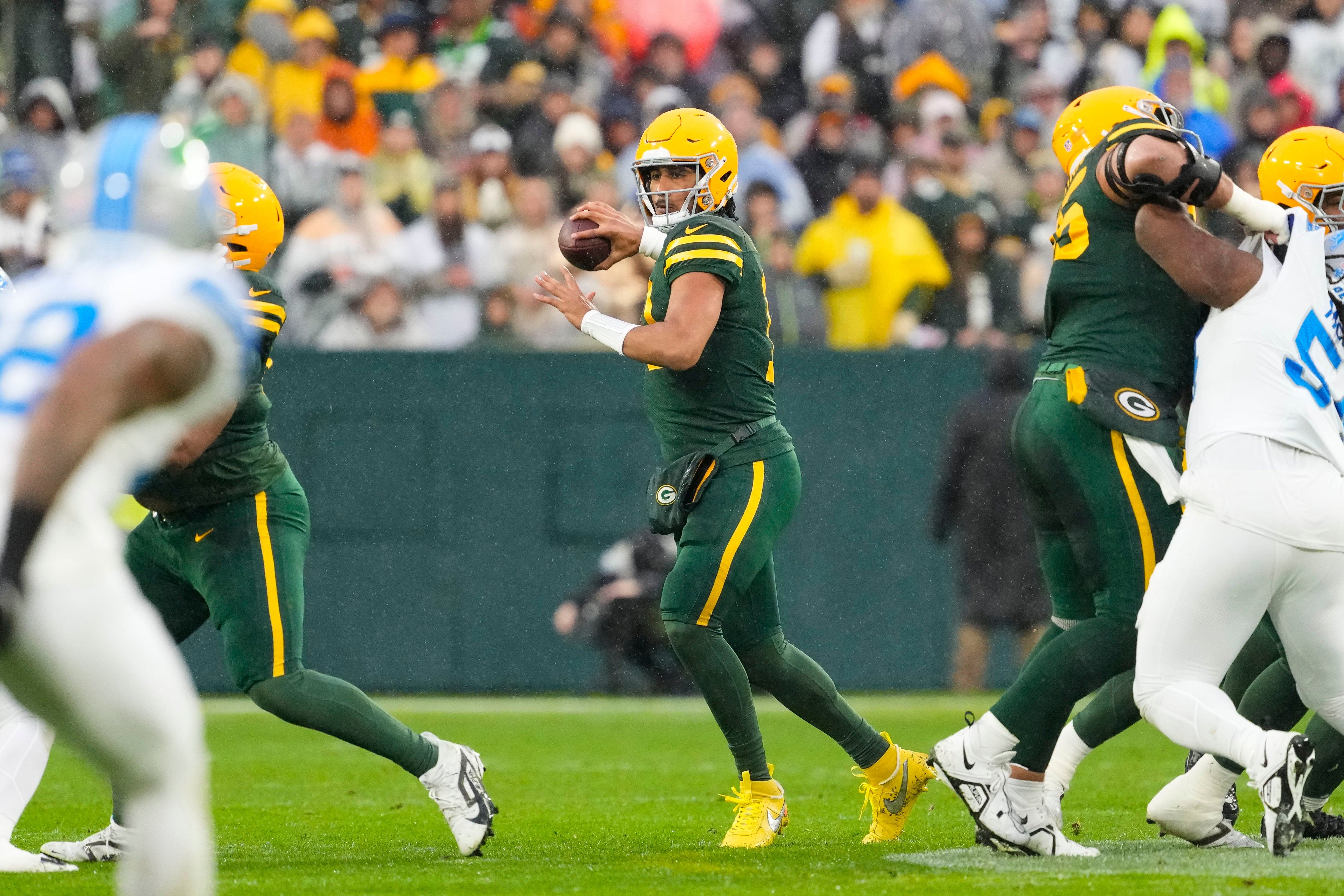Green Bay Packers quarterback Jordan Love (10) throws a pass during the first quarter against the Detroit Lions at Lambeau Field.