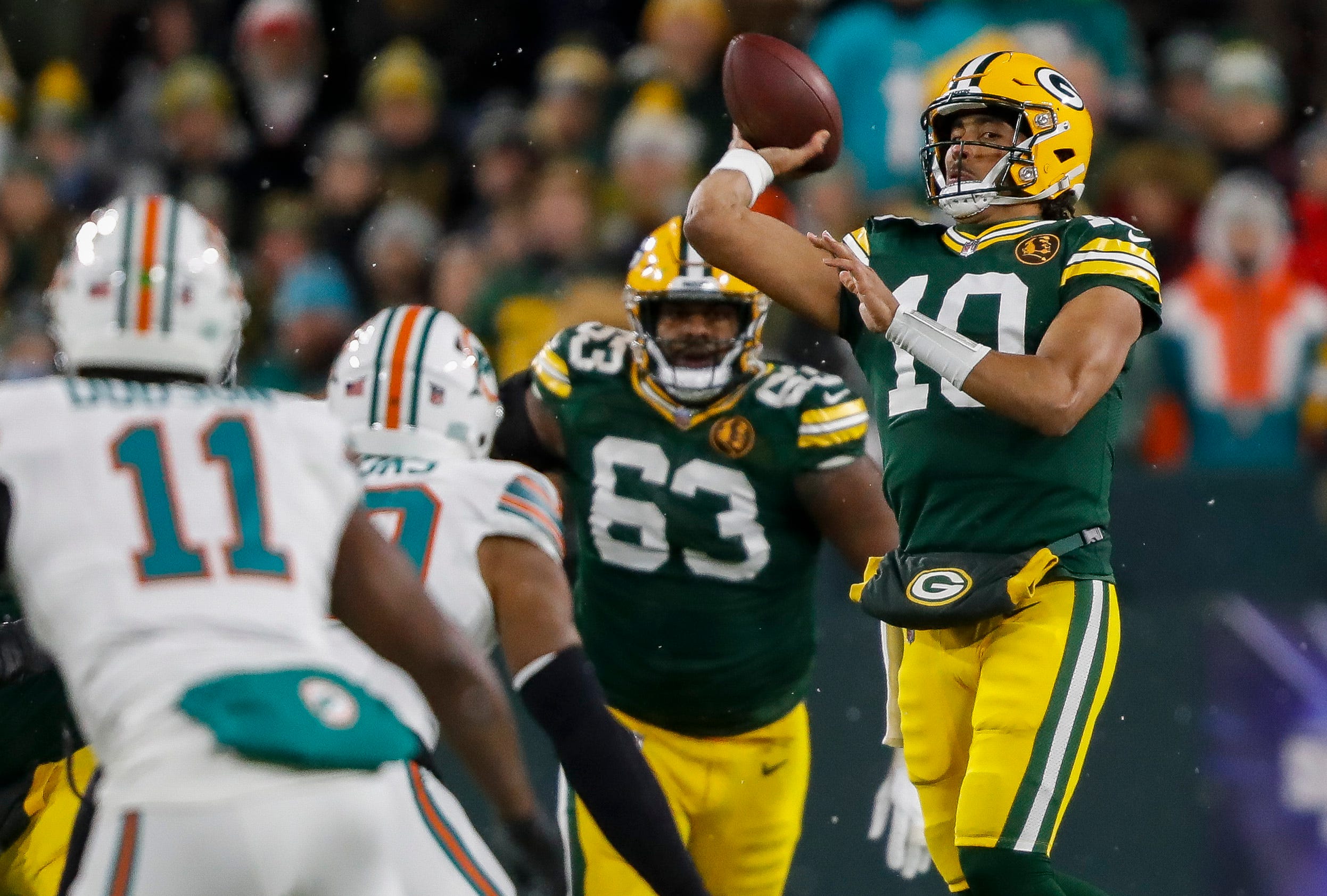 Green Bay Packers quarterback Jordan Love (10) passes the ball against the Miami Dolphins on Thursday, November 28, 2024, at Lambeau Field in Green Bay, Wis. The Packers won the game, 30-17.