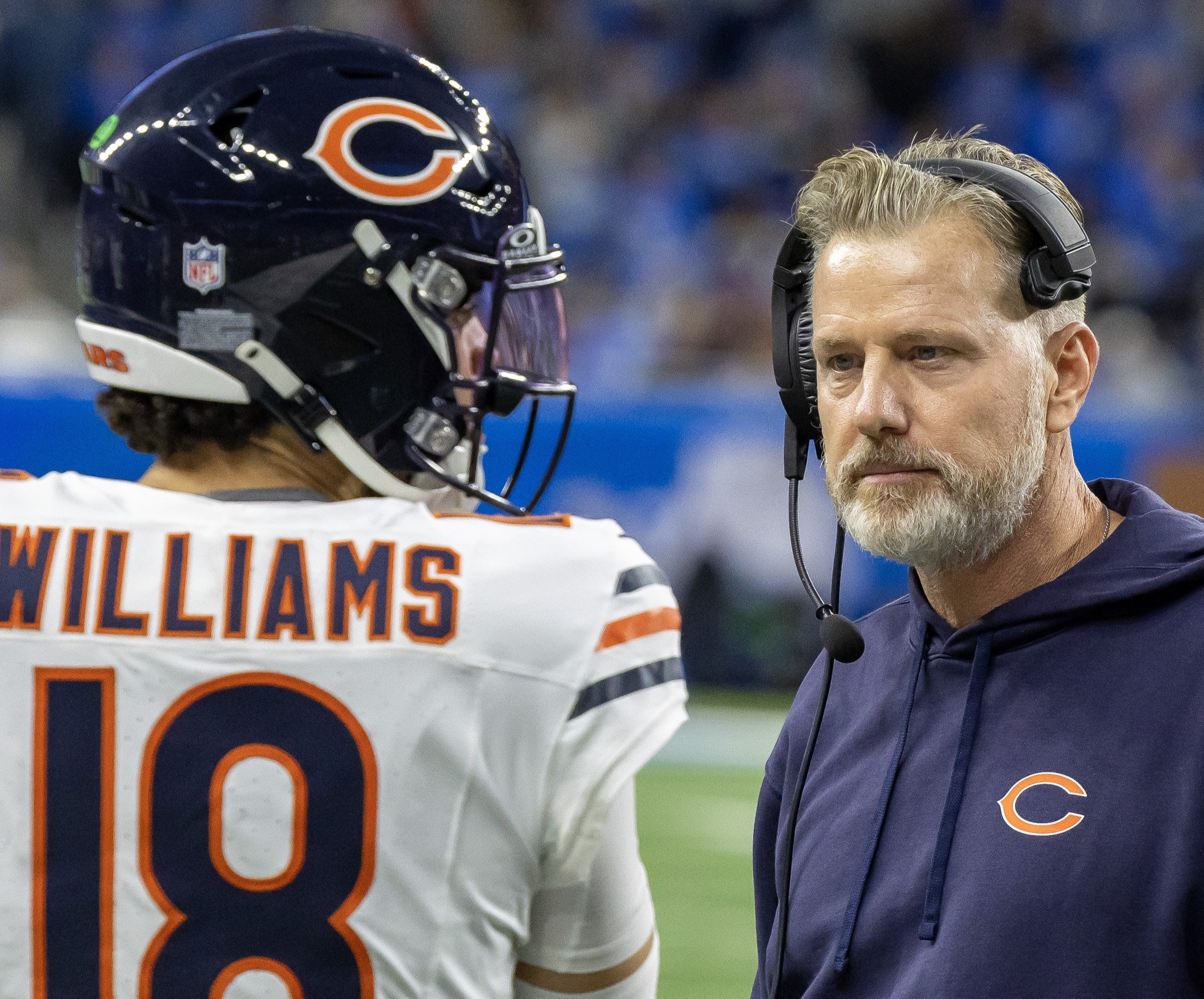 Nov 28, 2024; Detroit, Michigan, USA; Chicago Bears head coach Matt Eberflus talks to quarterback Caleb Williams (18) on the sidelines during the second half against the Detroit Lions at Ford Field.