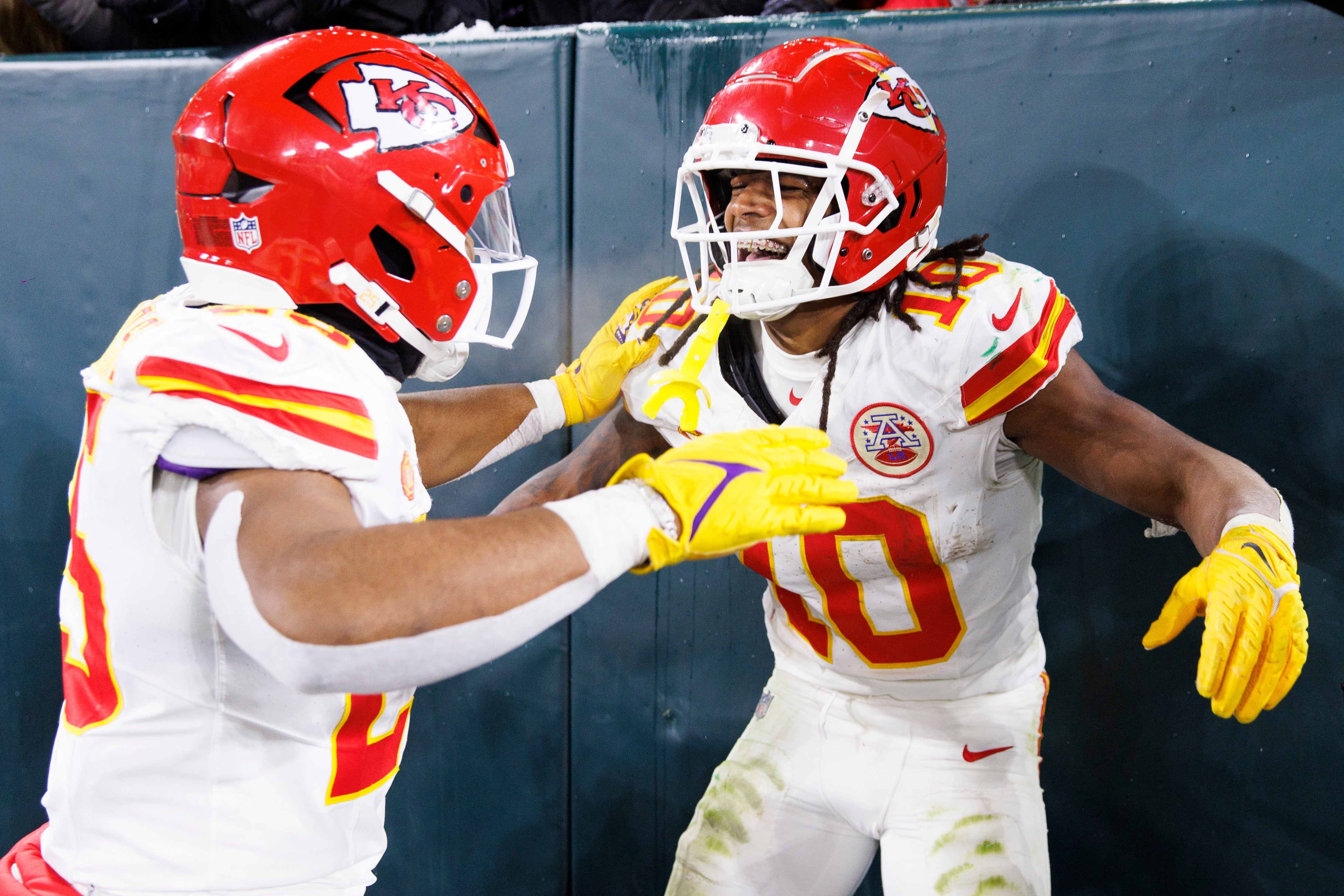 Dec 3, 2023; Green Bay, Wisconsin, USA; Kansas City Chiefs running back Isiah Pacheco (10) celebrates with running back Clyde Edwards-Helaire (25) after scoring a touchdown during the third quarter against the Green Bay Packers at Lambeau Field.