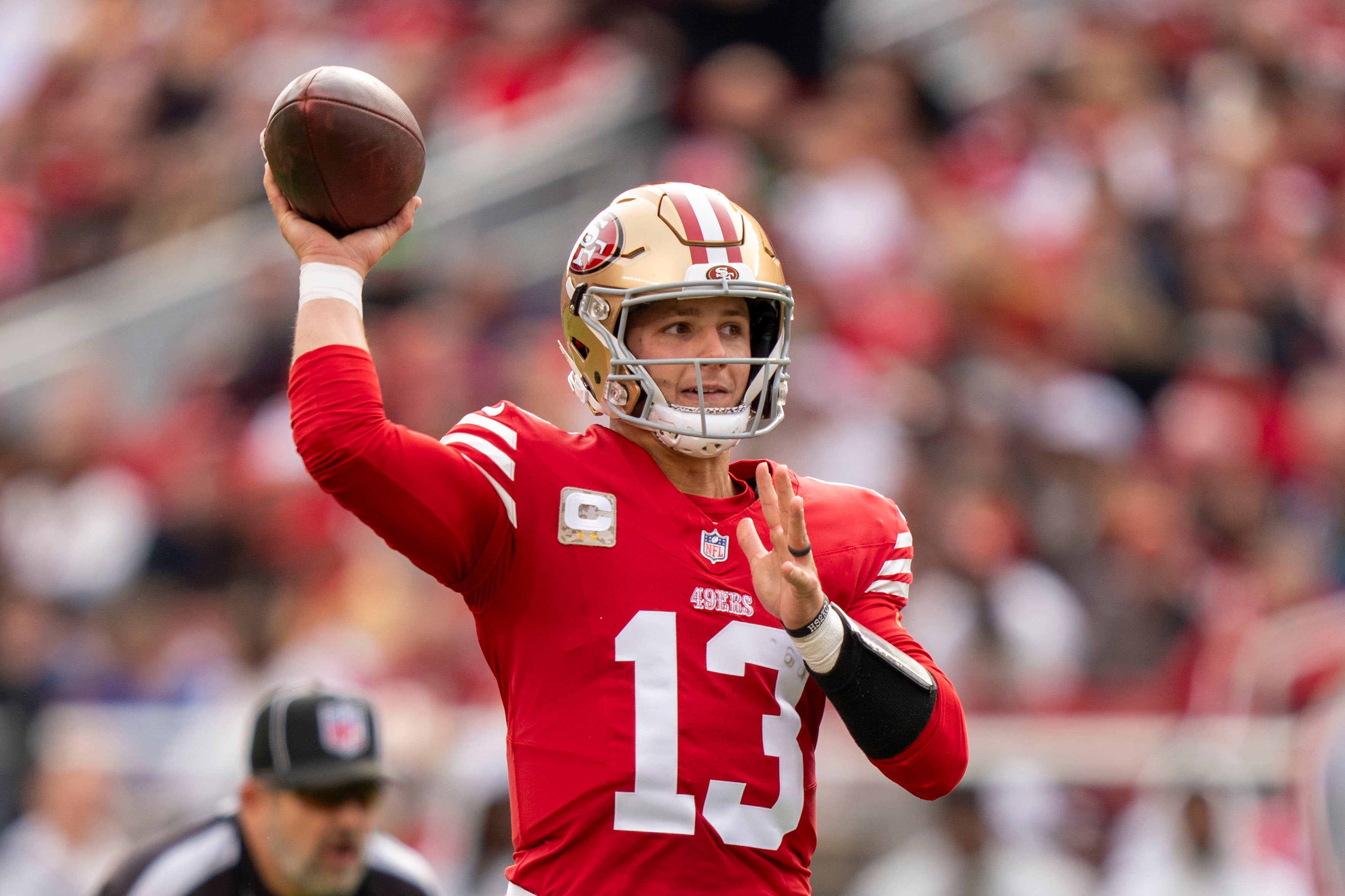 San Francisco 49ers quarterback Brock Purdy (13) passes the football against the Seattle Seahawks during the first quarter at Levi's Stadium.