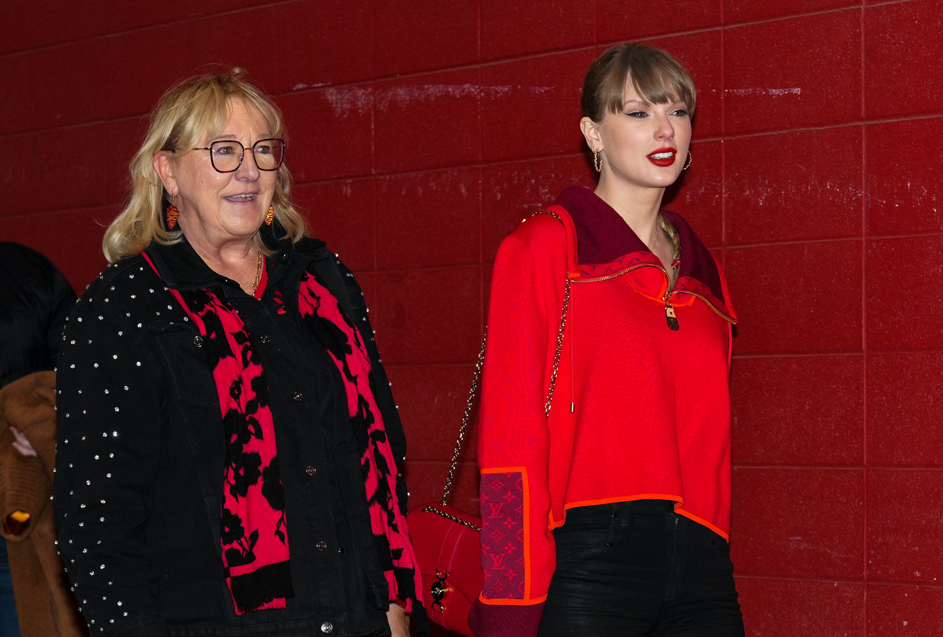 Nov 29, 2024; Kansas City, Missouri, USA; Recording artist Taylor Swift and Donna Kelce arrive prior to a game between the Kansas City Chiefs and the Las Vegas Raiders at GEHA Field at Arrowhead Stadium.