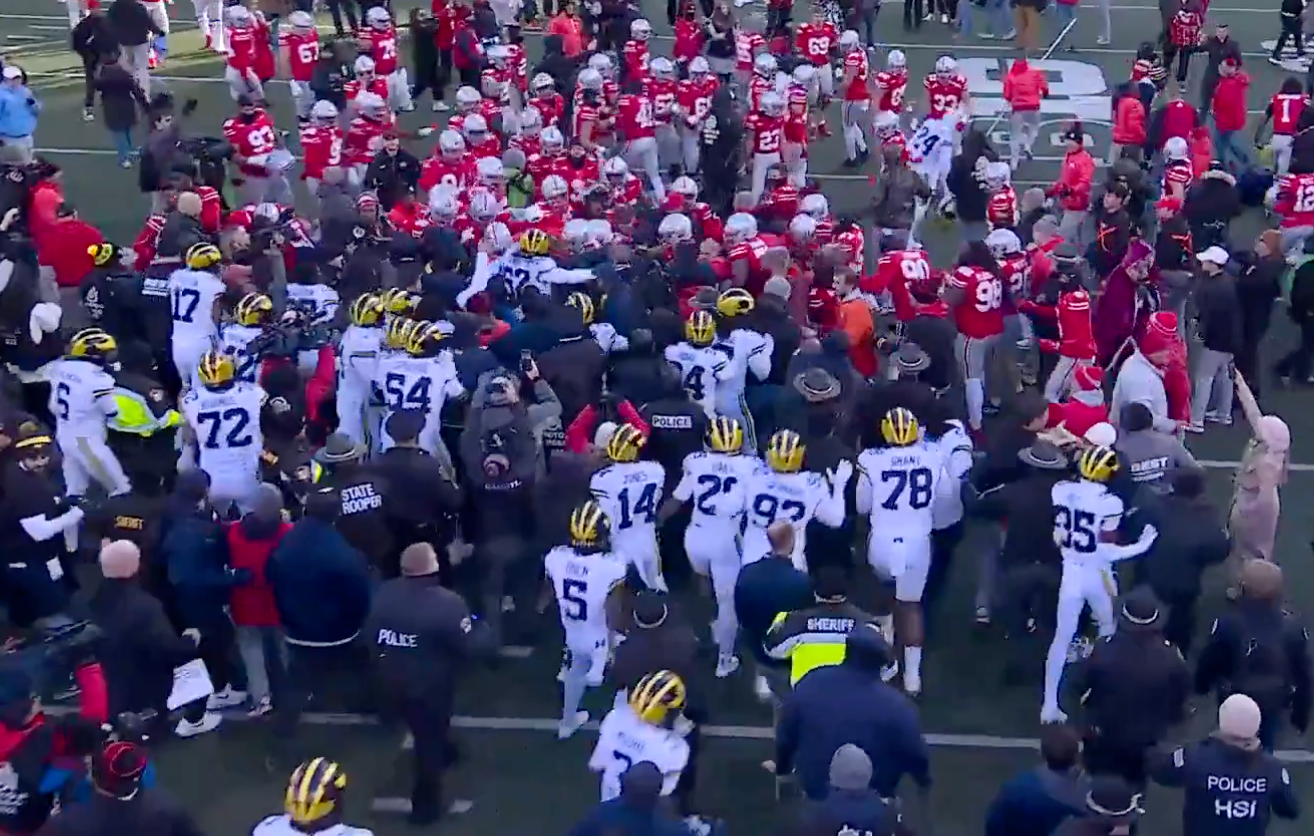 A fight breaks out at the end of Michigan-Ohio State game.