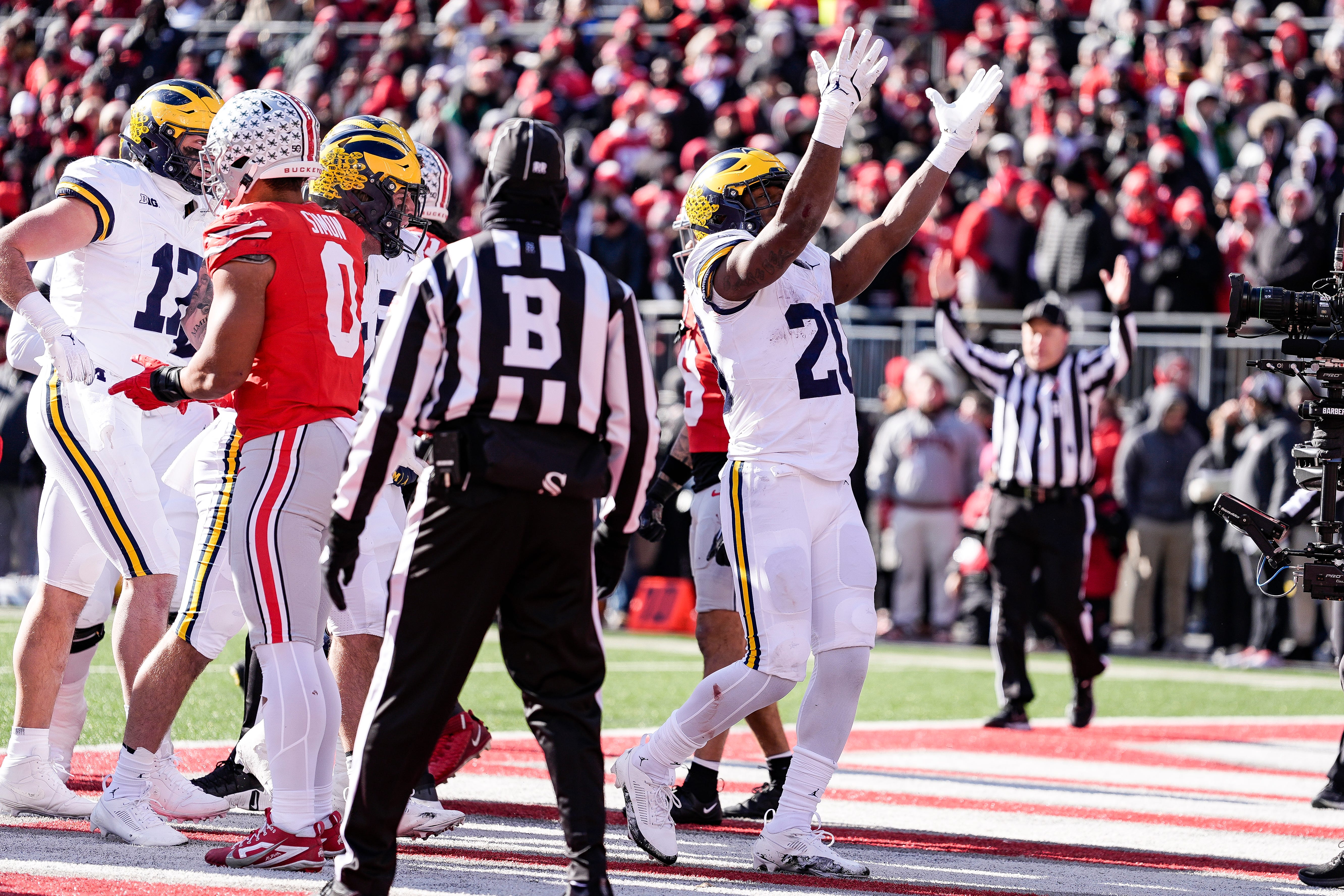 Michigan running back Kalel Mullings (20) runs for a touchdown against Ohio State during the first half at Ohio Stadium in Columbus, Ohio on Saturday, Nov. 30, 2024.