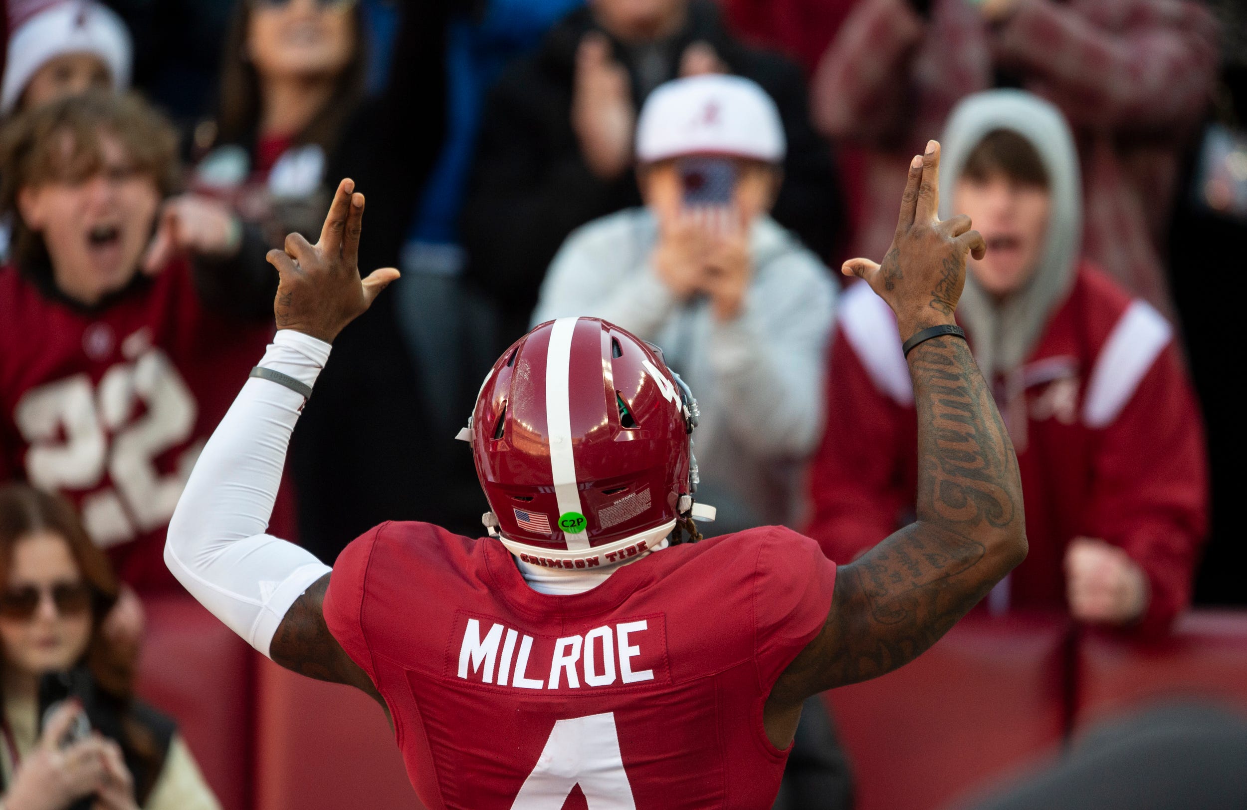 Alabama Crimson Tide quarterback Jalen Milroe (4) pumps up the crowd before Auburn Tigers take on Alabama Crimson Tide at Bryant-Denny Stadium in Tuscaloosa, Ala., on Saturday, Nov. 30, 2024. Alabama Crimson Tide leads Auburn Tigers 14-6 at halftime.  