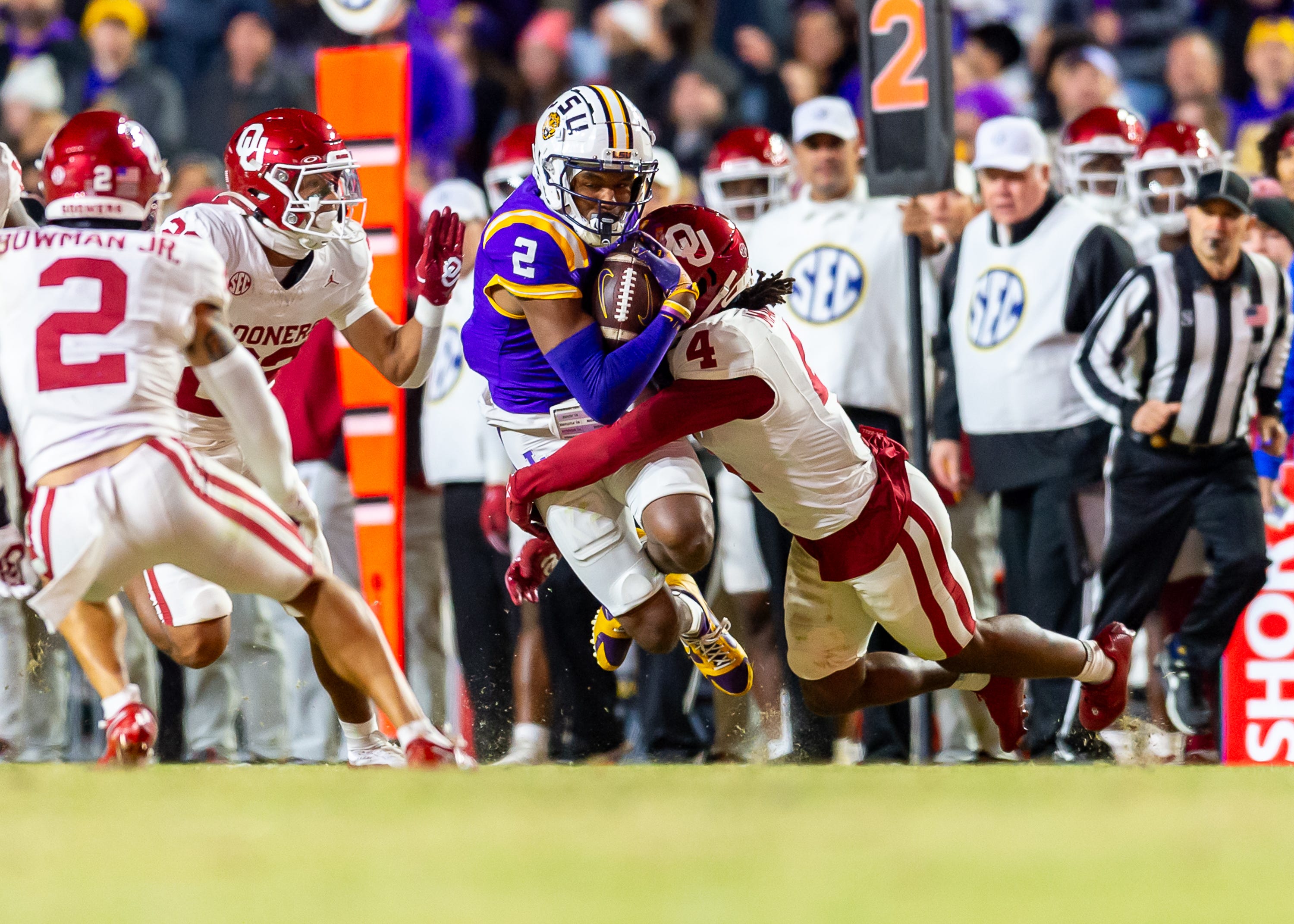 Kyren Lacy 2 runs the ball as the LSU Tigers take on the Oklahoma Sooners. Nov 30, 2024; Baton Rouge, Louisiana, USA; at Tiger Stadium.