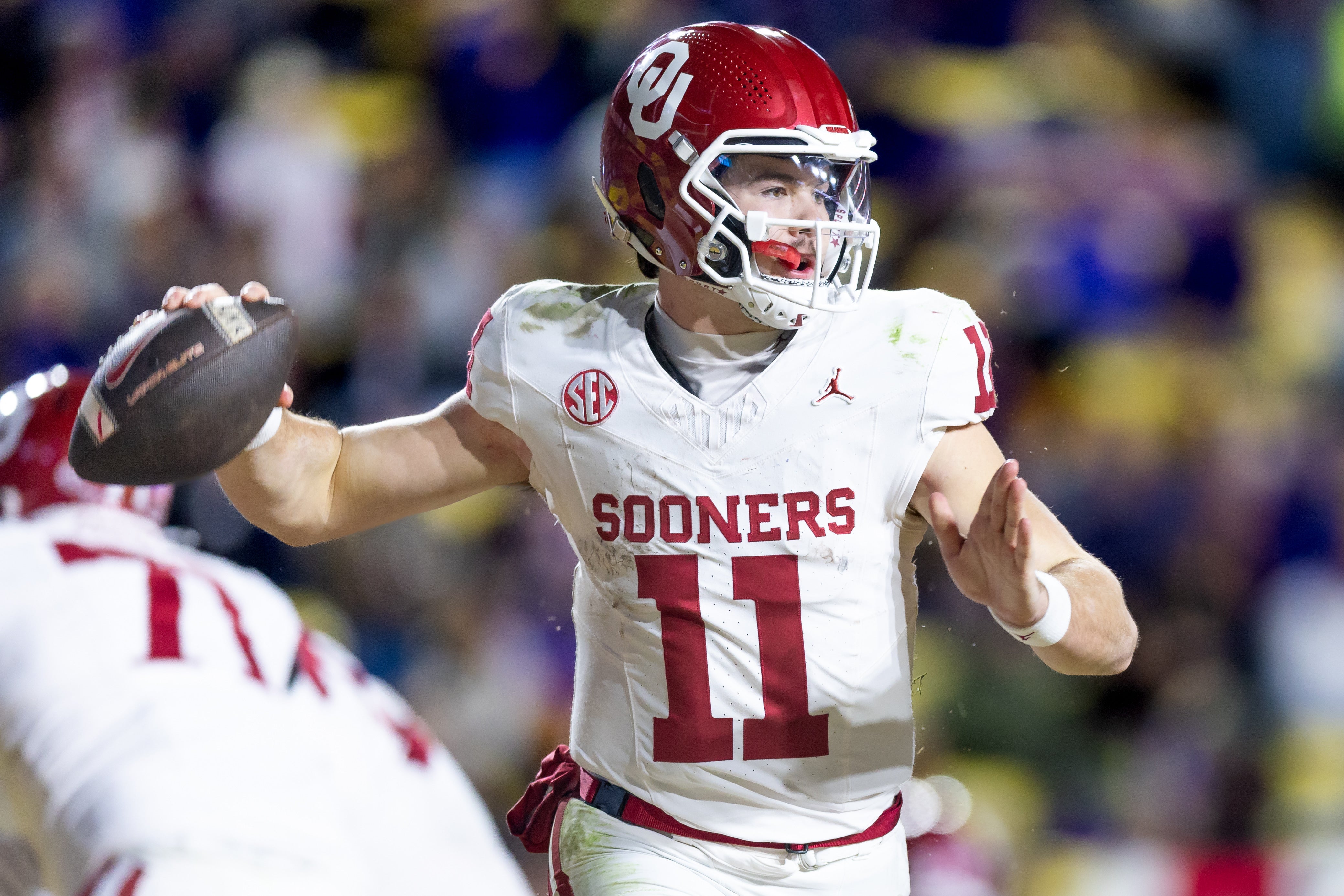Nov 30, 2024; Baton Rouge, Louisiana, USA; Oklahoma Sooners quarterback Jackson Arnold (11) passes against the LSU Tigers during the fourth quarter at Tiger Stadium.