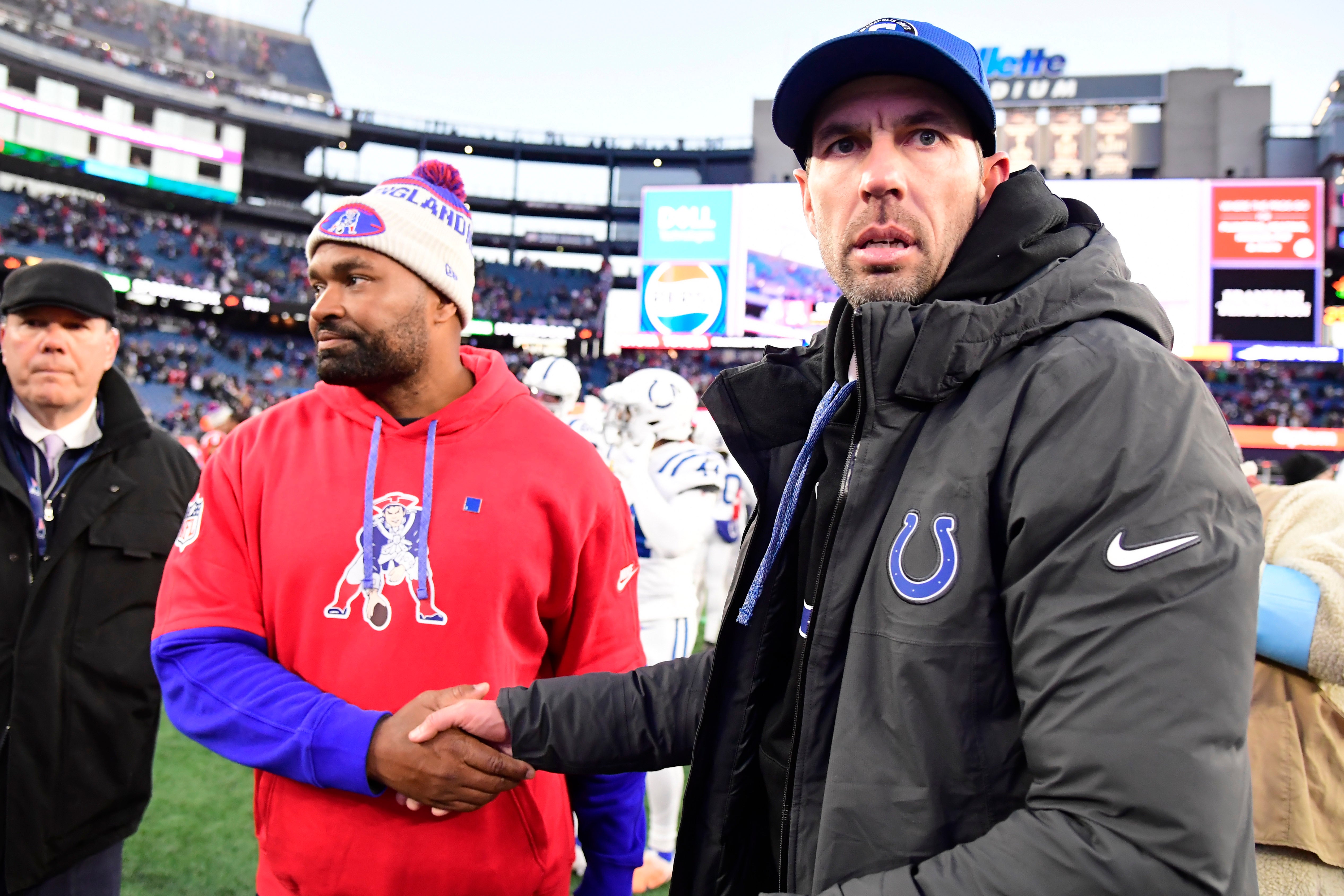 Dec 1, 2024; Foxborough, Massachusetts, USA; New England Patriots head coach Jerod Mayo and Indianapolis Colts Shane Steichen shake hands at the end of the game at Gillette Stadium.