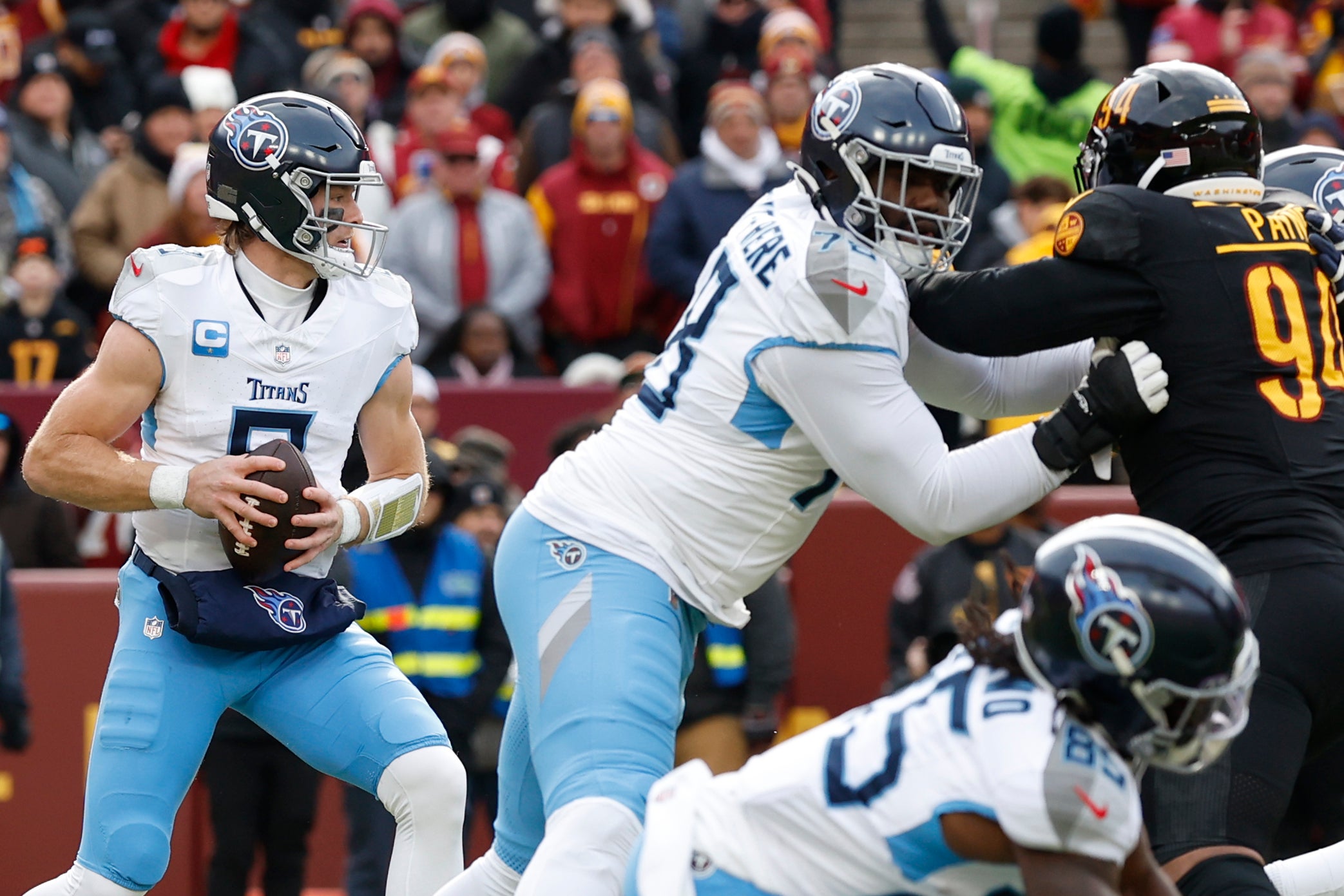 Tennessee Titans quarterback Will Levis (8) prepares to pass the ball under pressure from Washington Commanders defensive tackle Daron Payne (94) during the first quarter at Northwest Stadium. Geoff Burke-Imagn Images 