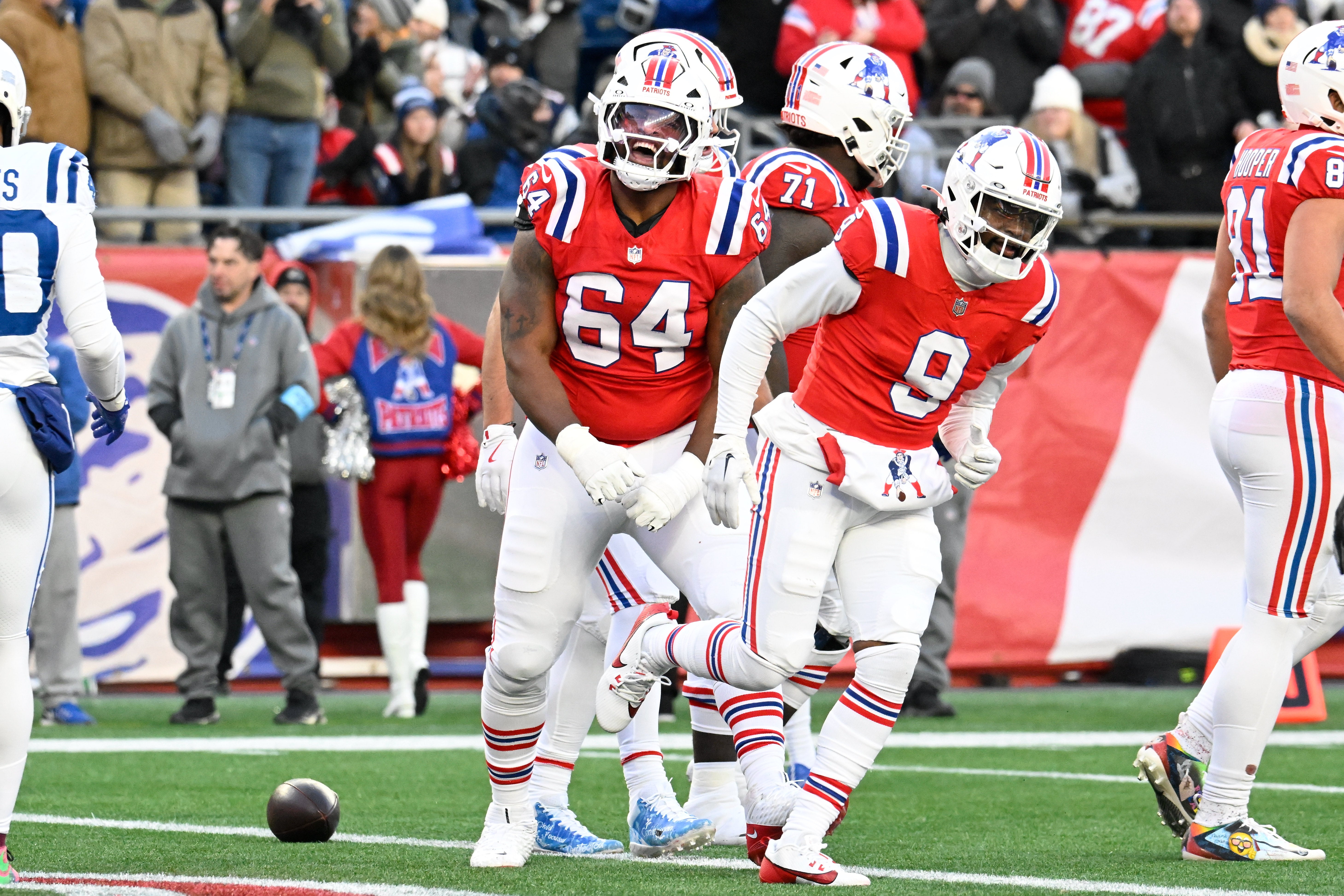 Dec 1, 2024; Foxborough, Massachusetts, USA; New England Patriots guard Layden Robinson (64) reacts to game action during the second half against the Indianapolis Colts at Gillette Stadium.