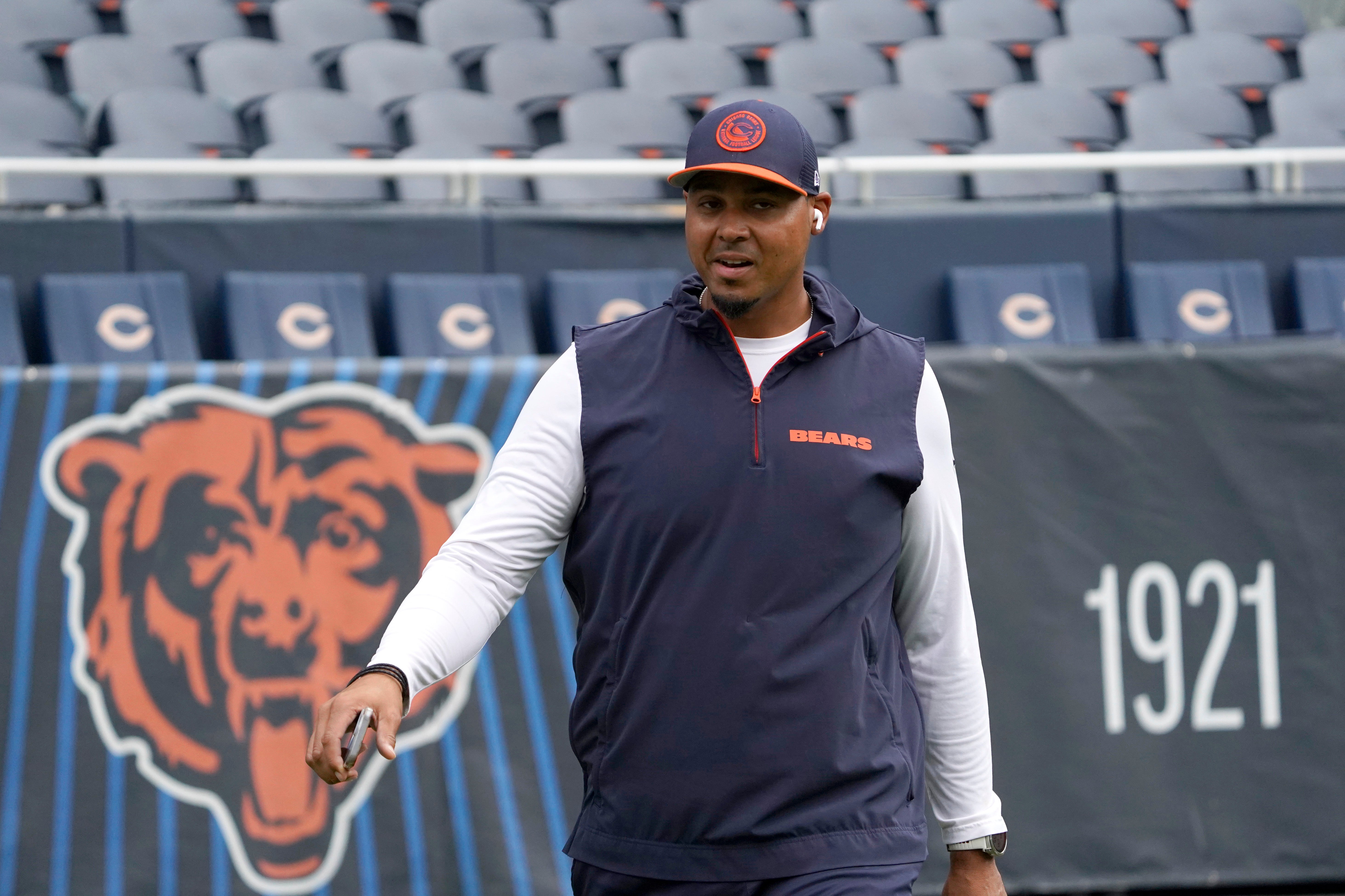 Aug 17, 2024; Chicago, Illinois, USA; Chicago Bears general manager Ryan Poles on the field before the game between the Chicago Bears and the Cincinnati Bengals at Soldier Field.