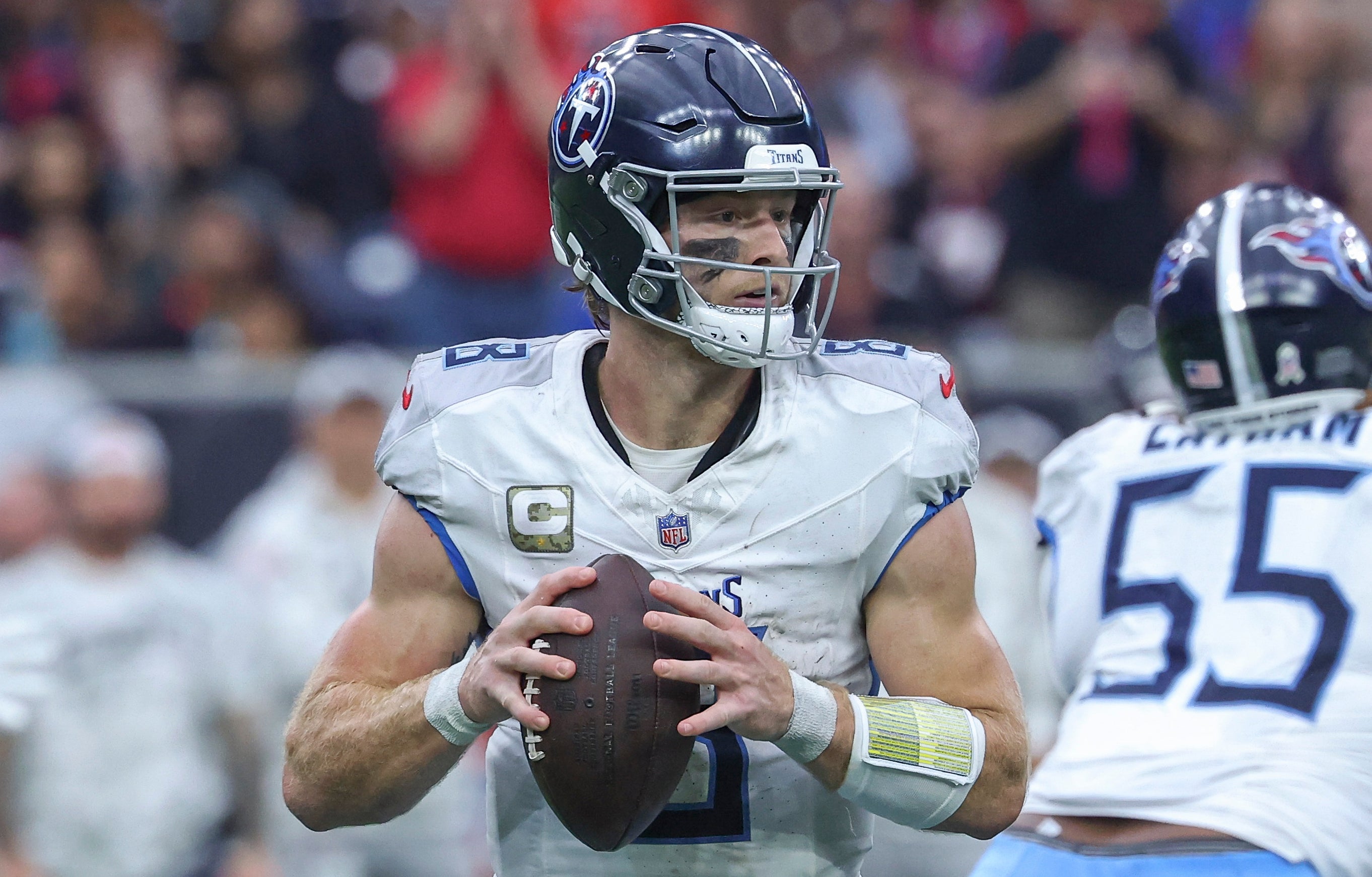 Tennessee Titans quarterback Will Levis (8) looks for an open receiver during the third quarter against the Houston Texans at NRG Stadium. Troy Taormina-Imagn Images 