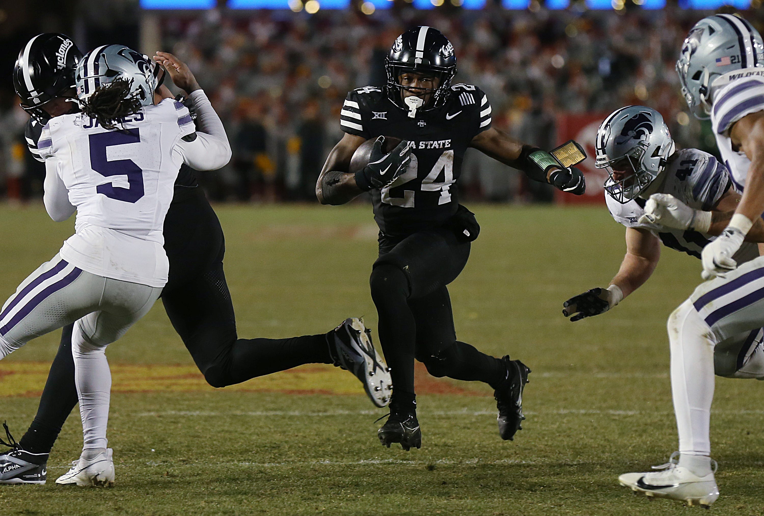 Iowa State Cyclones running back Abu Sama III (24) runs with the ball for a first down against the Kansas State Wildcats.