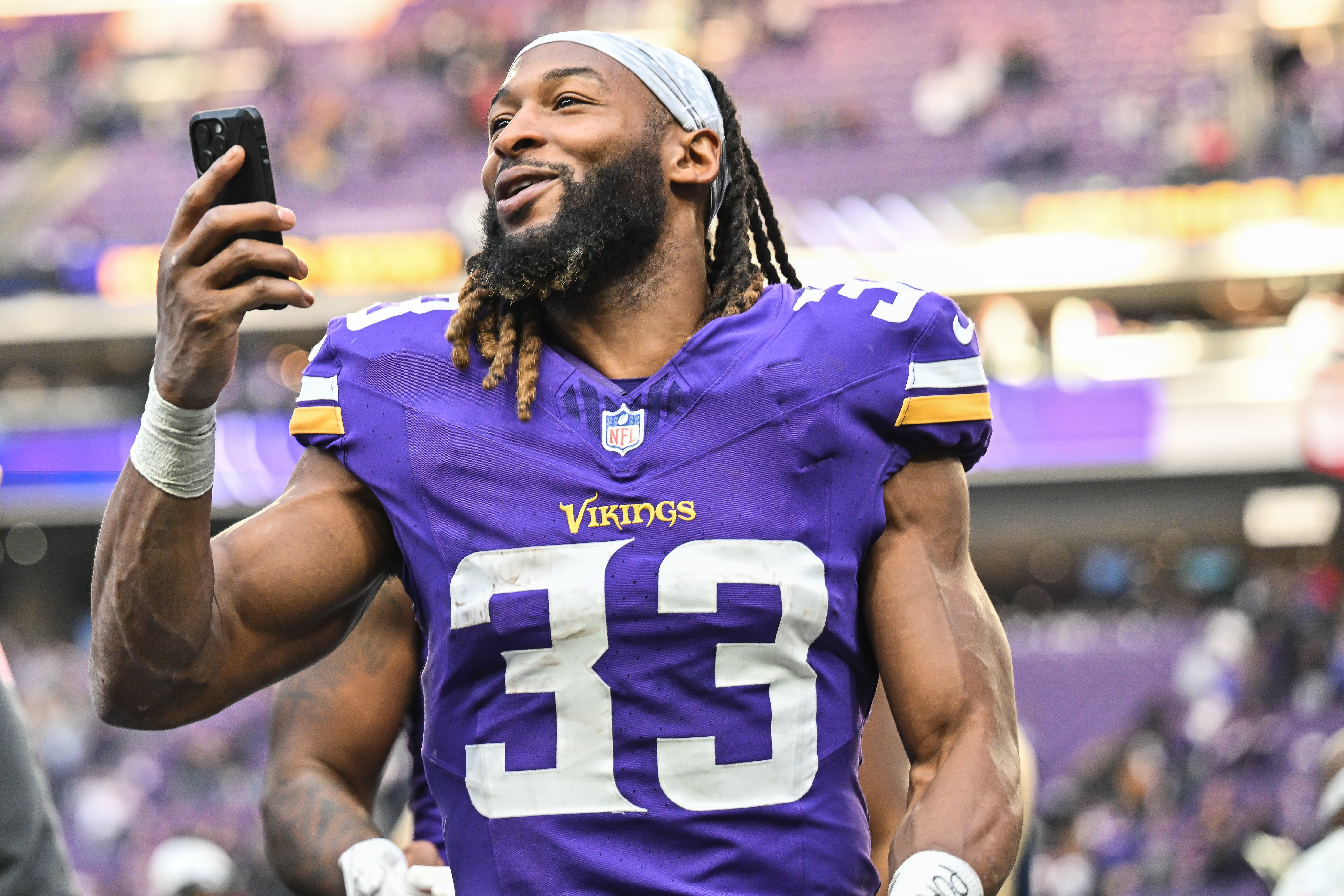Dec 1, 2024; Minneapolis, Minnesota, USA; Minnesota Vikings running back Aaron Jones (33) reacts after the game against the Arizona Cardinals at U.S. Bank Stadium.