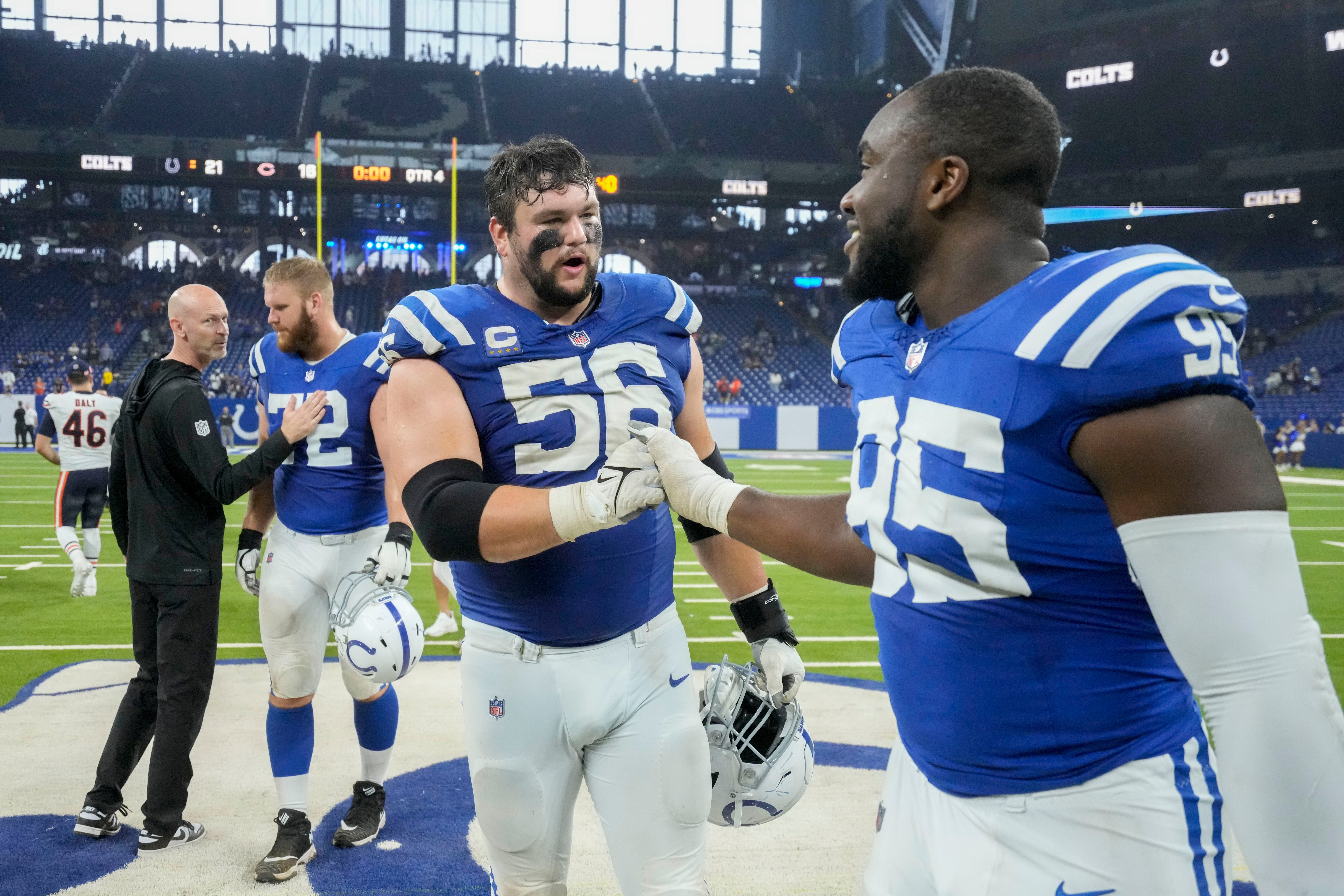 Sep 22, 2024; Indianapolis, Indiana, USA; Indianapolis Colts guard Quenton Nelson (56) and Indianapolis Colts defensive tackle Adetomiwa Adebawore (95) celebrate after a game against the Chicago Bear at Lucas Oil Stadium.