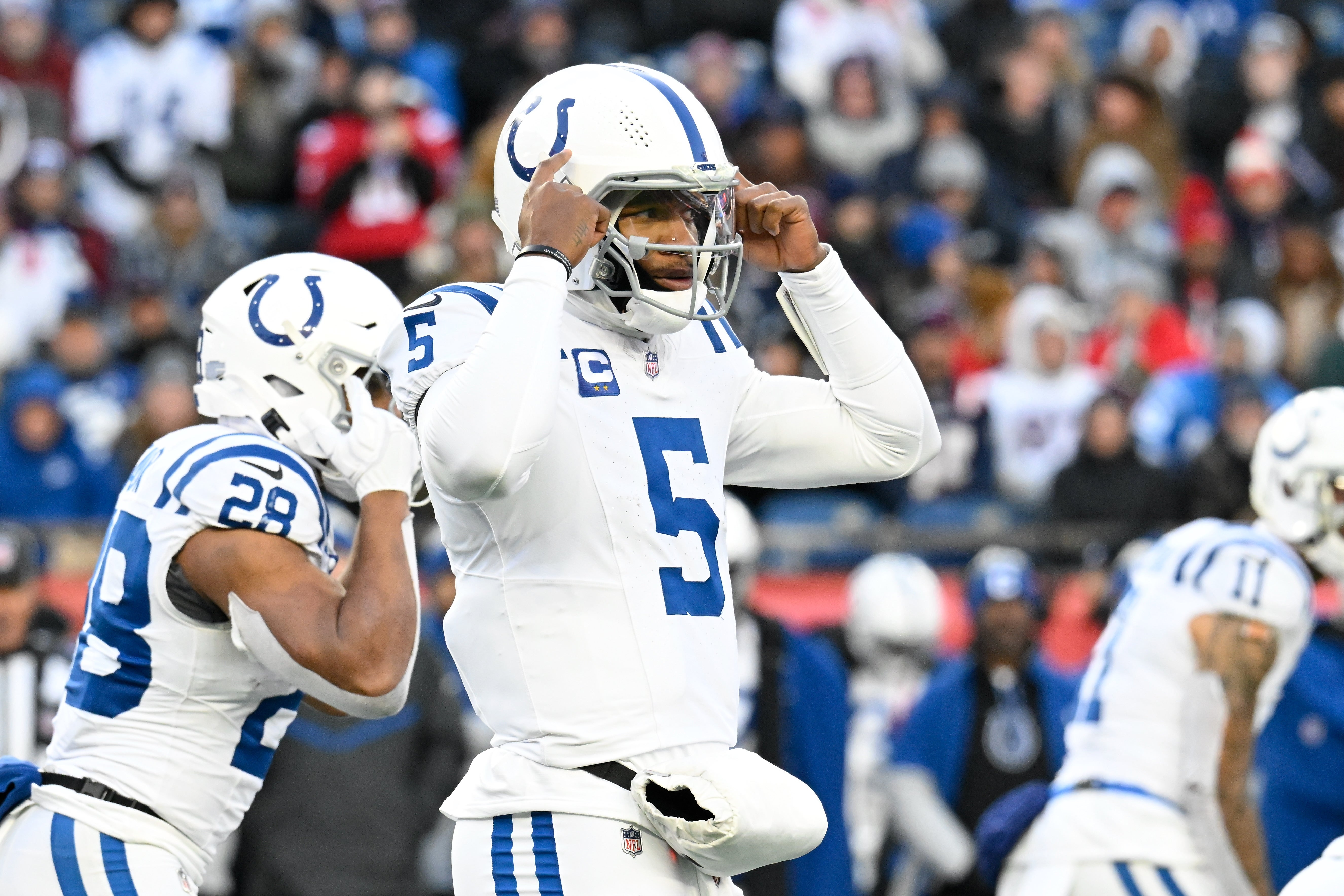 Dec 1, 2024; Foxborough, Massachusetts, USA; Indianapolis Colts quarterback Anthony Richardson (5) signals during the second half against the New England Patriots at Gillette Stadium.