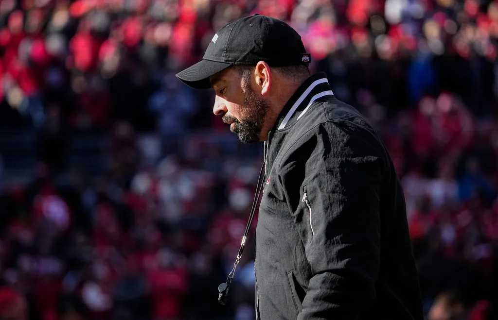 Ohio State Buckeyes head coach Ryan Day watches warm ups prior to the NCAA football game against the Michigan Wolverines at Ohio Stadium in Columbus on Tuesday, Dec. 3, 2024. Michigan won 13-10