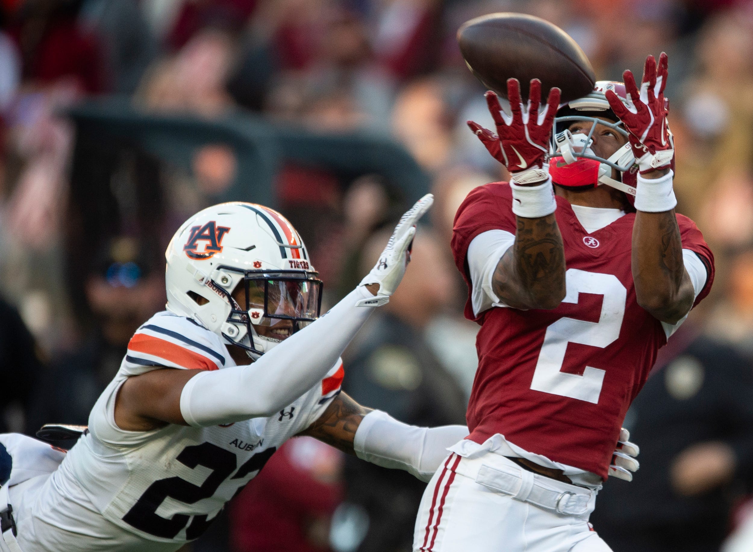 Alabama Crimson Tide wide receiver Ryan Williams (2) drops a pass guarded by Auburn Tigers defensive back Jay Crawford (23) as Auburn Tigers take on Alabama Crimson Tide at Bryant-Denny Stadium in Tuscaloosa, Ala., on Saturday, Nov. 30, 2024. Alabama Crimson Tide leads Auburn Tigers 14-6 at halftime.