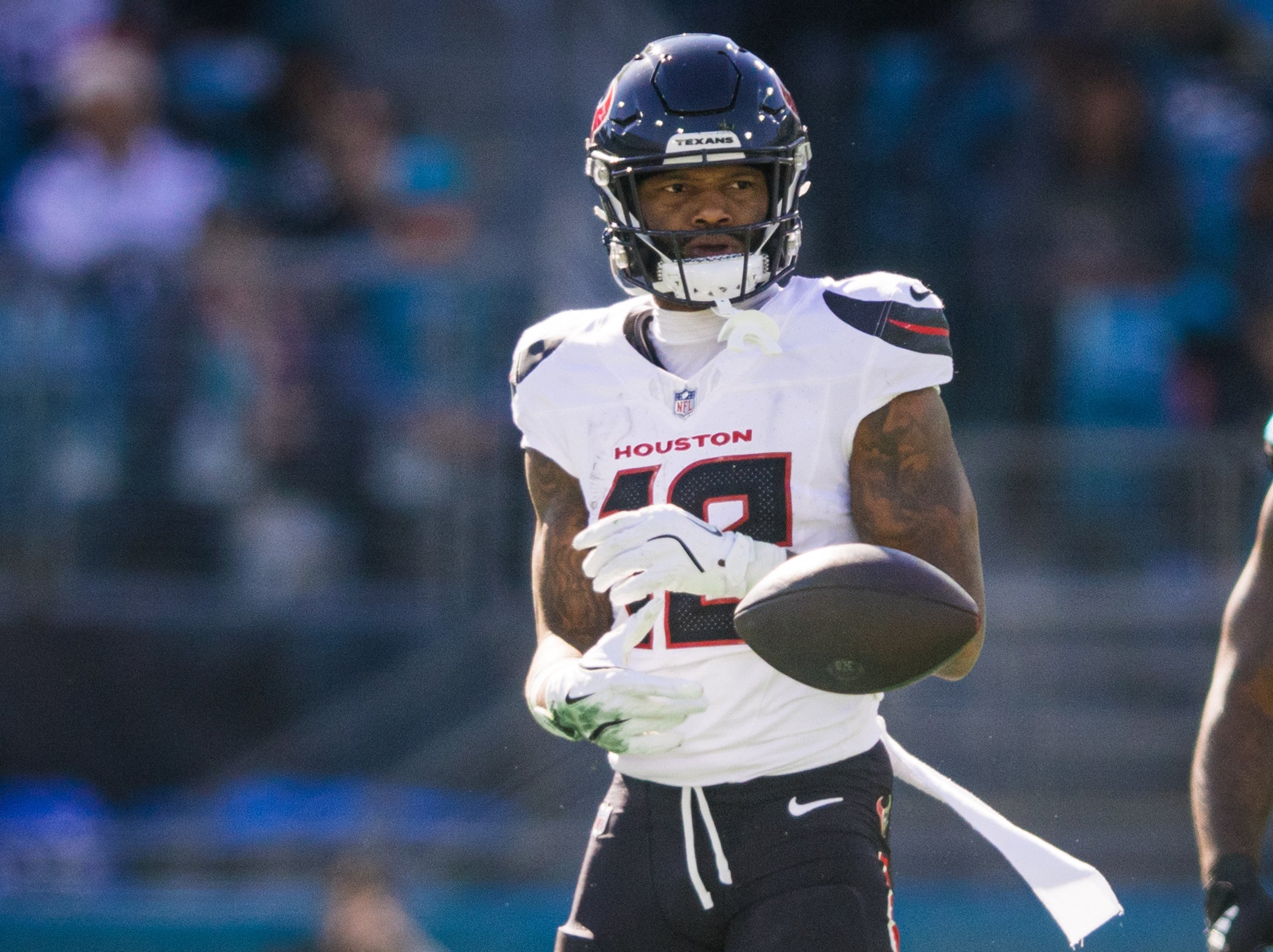 Dec 1, 2024; Jacksonville, Florida, USA; Houston Texans wide receiver Nico Collins (12) celebrates a first down after the catch against the Jacksonville Jaguars in the first quarter at EverBank Stadium.