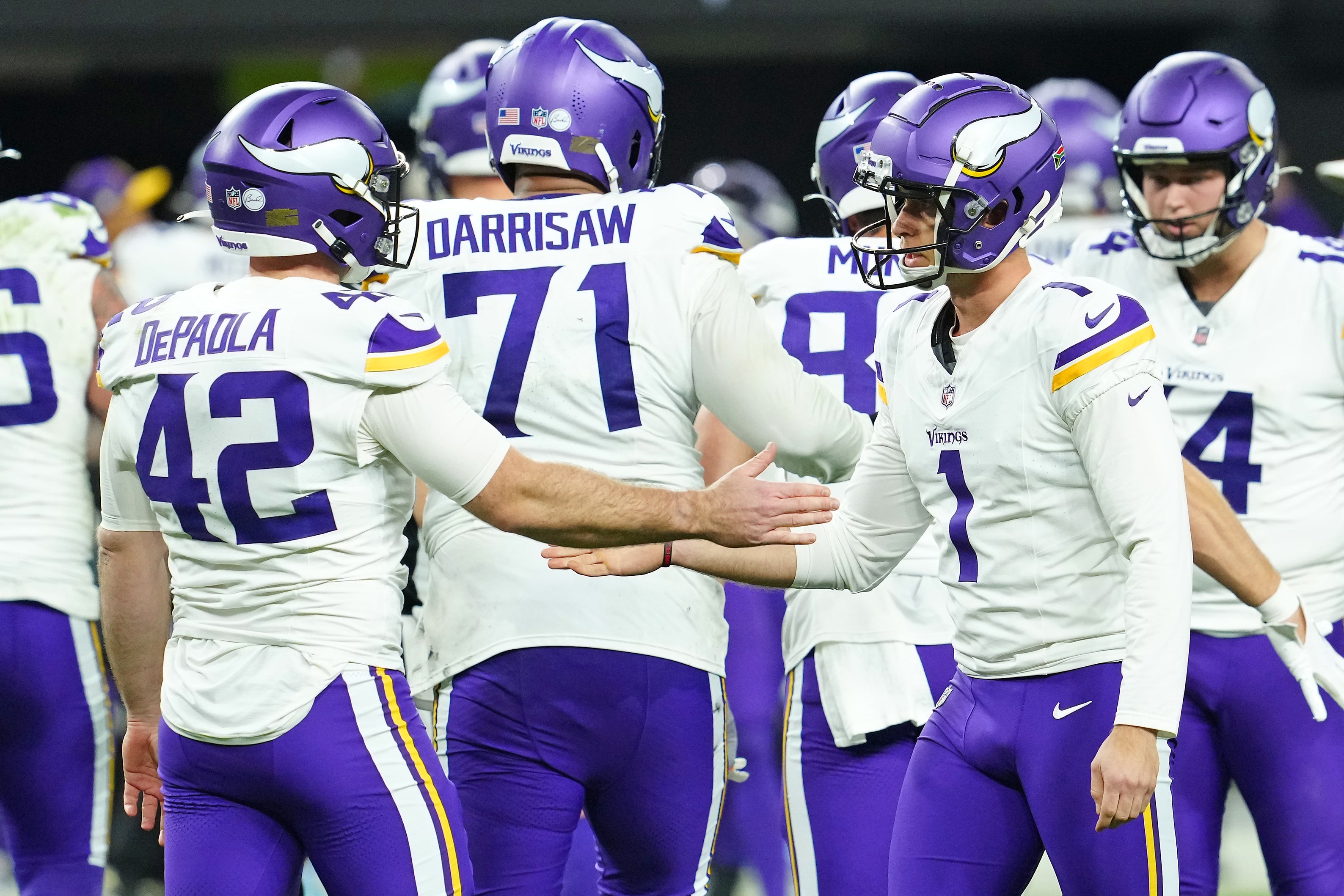Dec 10, 2023; Paradise, Nevada, USA; Minnesota Vikings place kicker Greg Joseph (1) celebrates with Minnesota Vikings long snapper Andrew DePaola (42) after kicking a field goal against the Las Vegas Raiders during the fourth quarter at Allegiant Stadium.