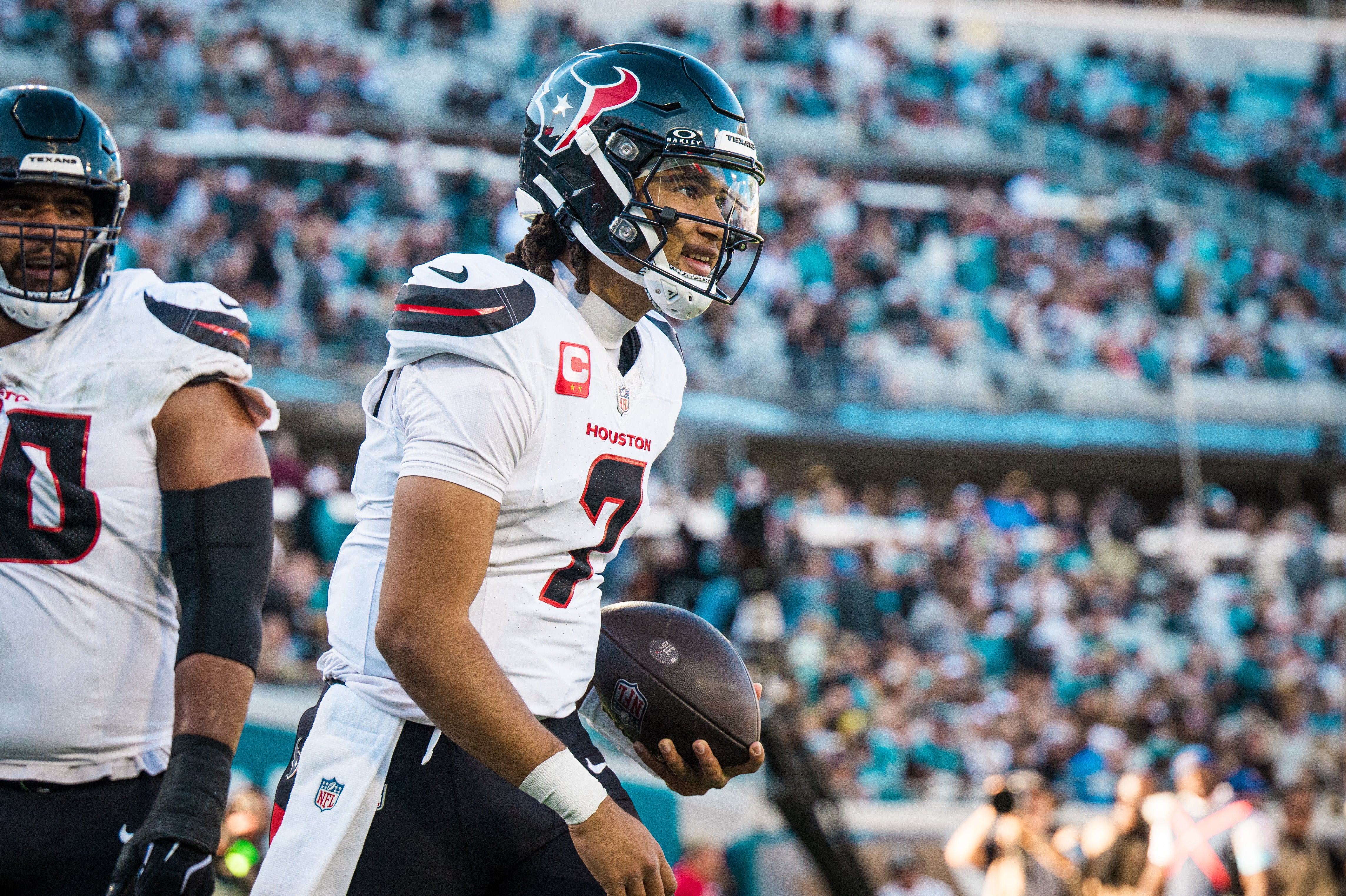 Dec 1, 2024; Jacksonville, Florida, USA; Houston Texans quarterback C.J. Stroud (7) celebrates a touchdown against the Jacksonville Jaguars in the fourth quarter at EverBank Stadium.