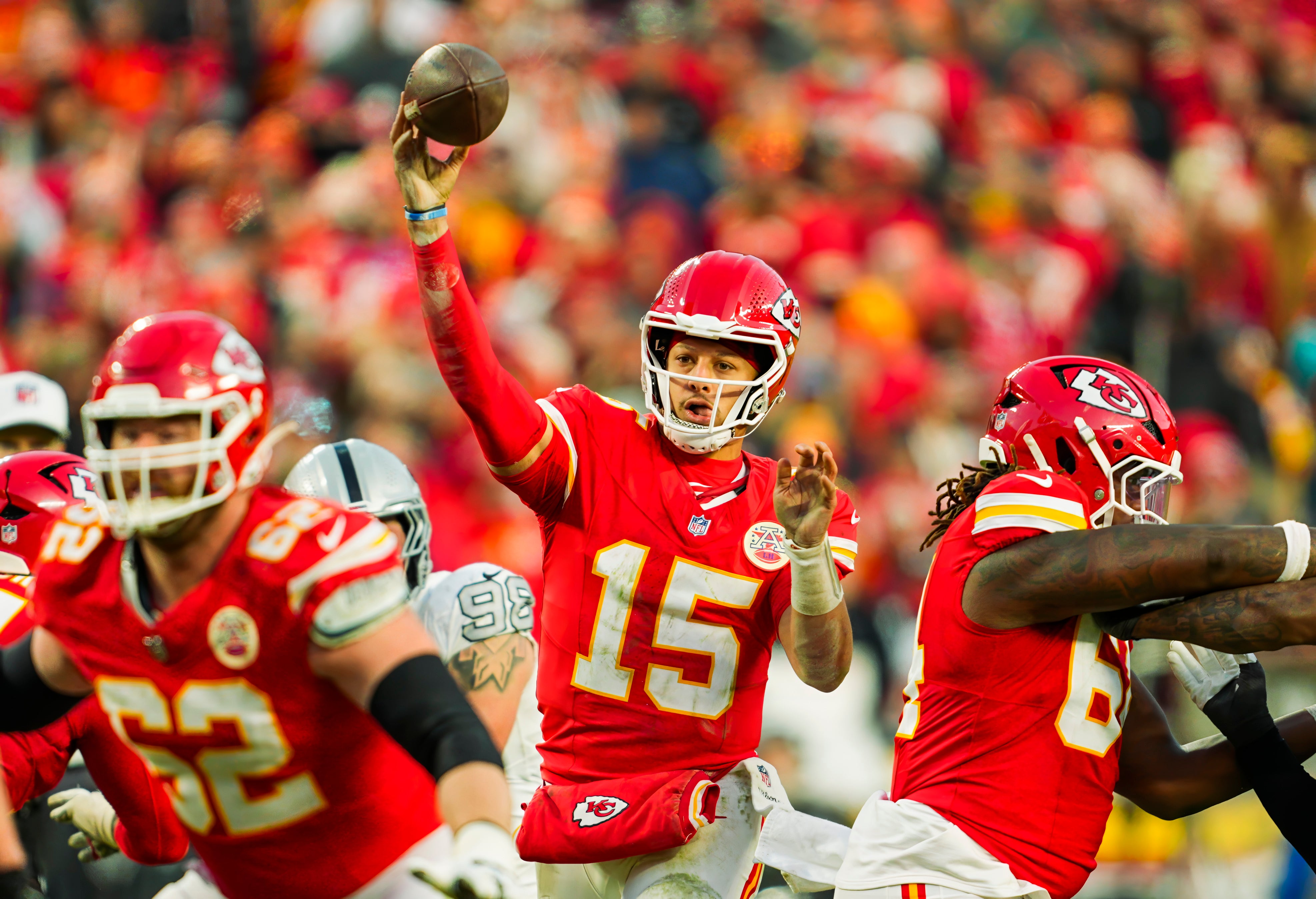 Nov 29, 2024; Kansas City, Missouri, USA; Kansas City Chiefs quarterback Patrick Mahomes (15) throws a pass during the second half against the Las Vegas Raiders at GEHA Field at Arrowhead Stadium.