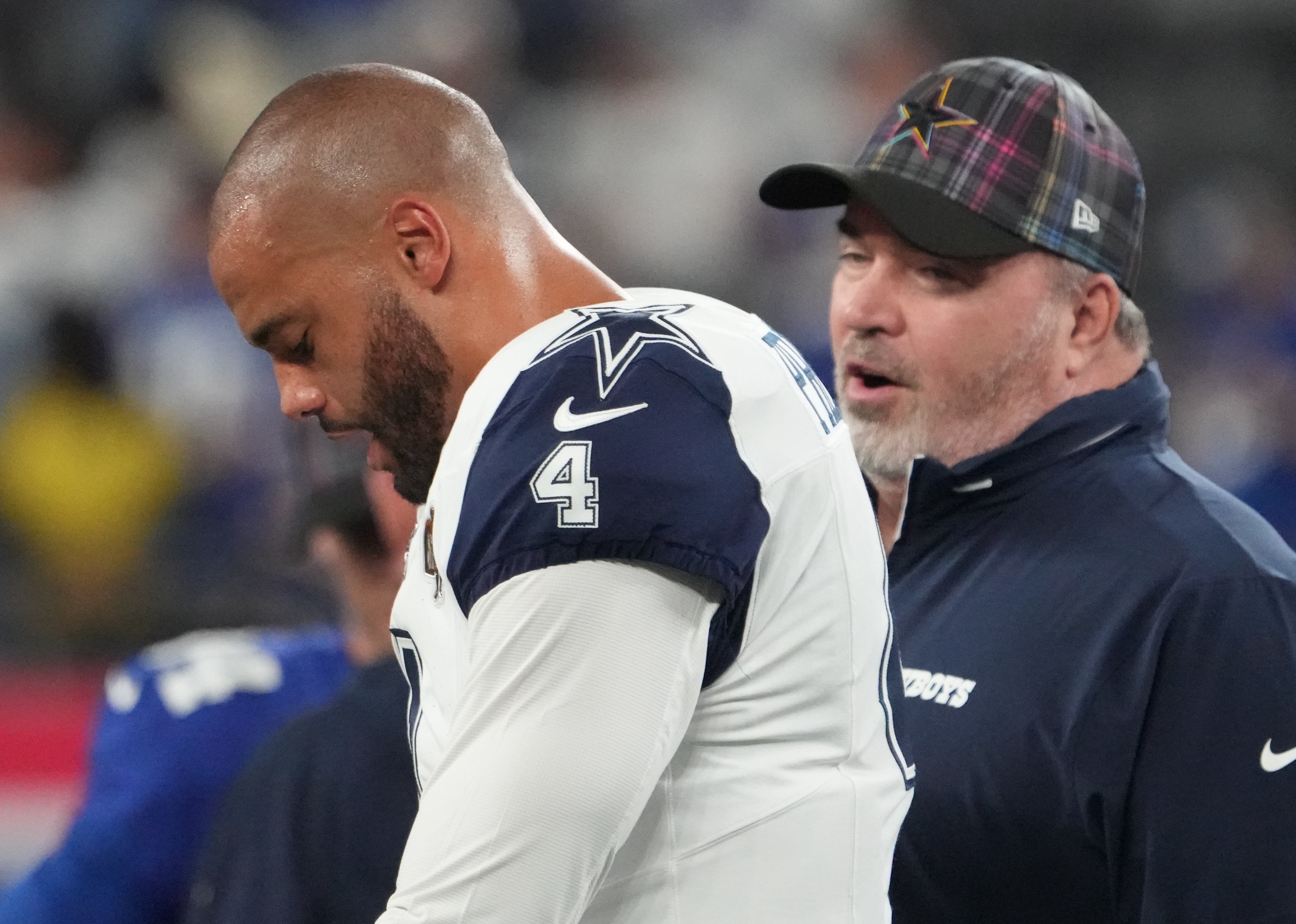 Dallas Cowboys quarterback Dak Prescott (4) and head coach Mike McCarthy before the game against the New York Giants at MetLife Stadium.