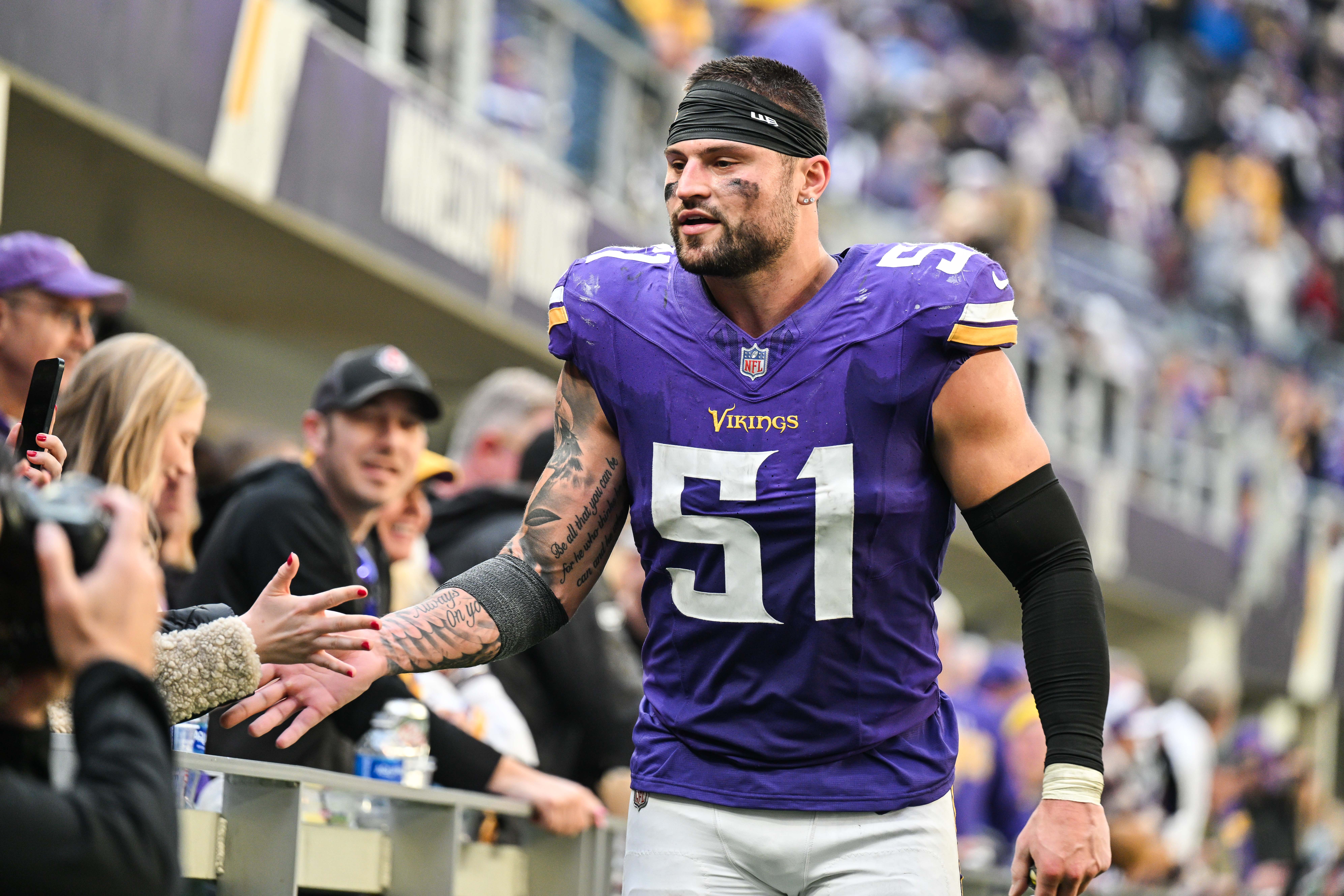 Dec 1, 2024; Minneapolis, Minnesota, USA; Minnesota Vikings linebacker Blake Cashman (51) reacts with the crowd after the game against the Arizona Cardinals at U.S. Bank Stadium.