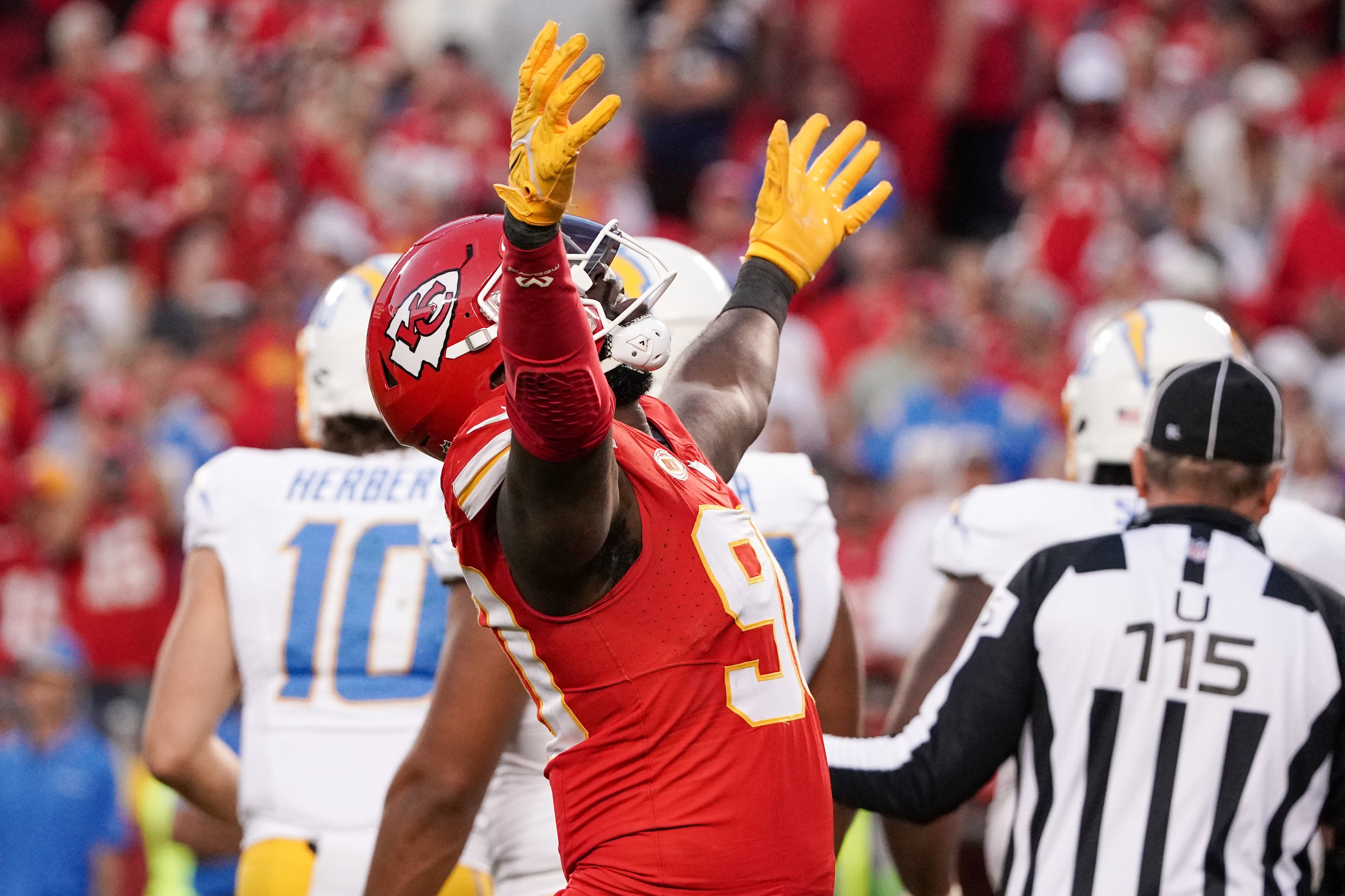 Oct 22, 2023; Kansas City, Missouri, USA; Kansas City Chiefs defensive end Charles Omenihu (90) celebrates after a sack against the Los Angeles Chargers during the second half at GEHA Field at Arrowhead Stadium.