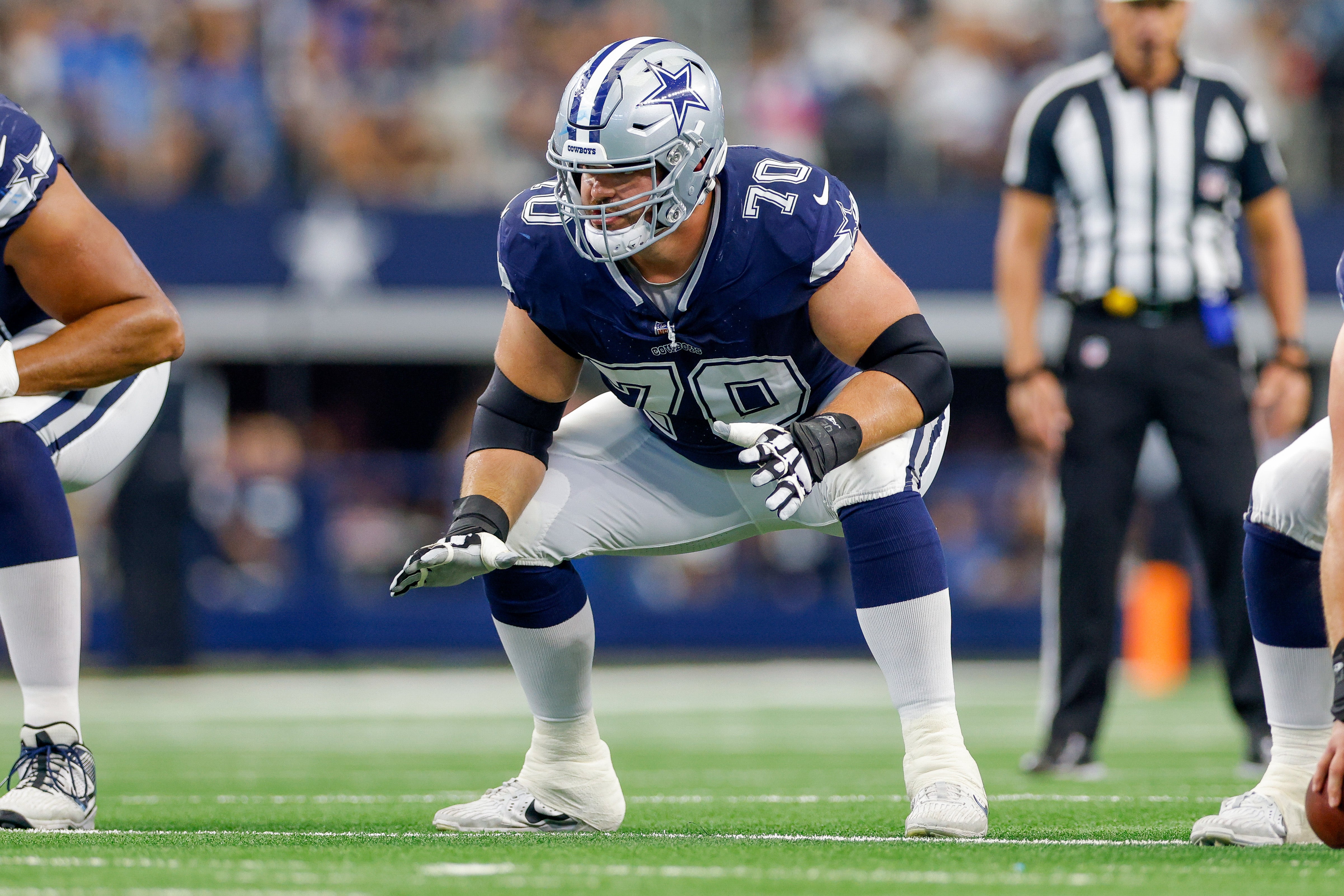 Dallas Cowboys guard Zack Martin (70) lines up for the snap during the first quarter against the Detroit Lions at AT&T Stadium.