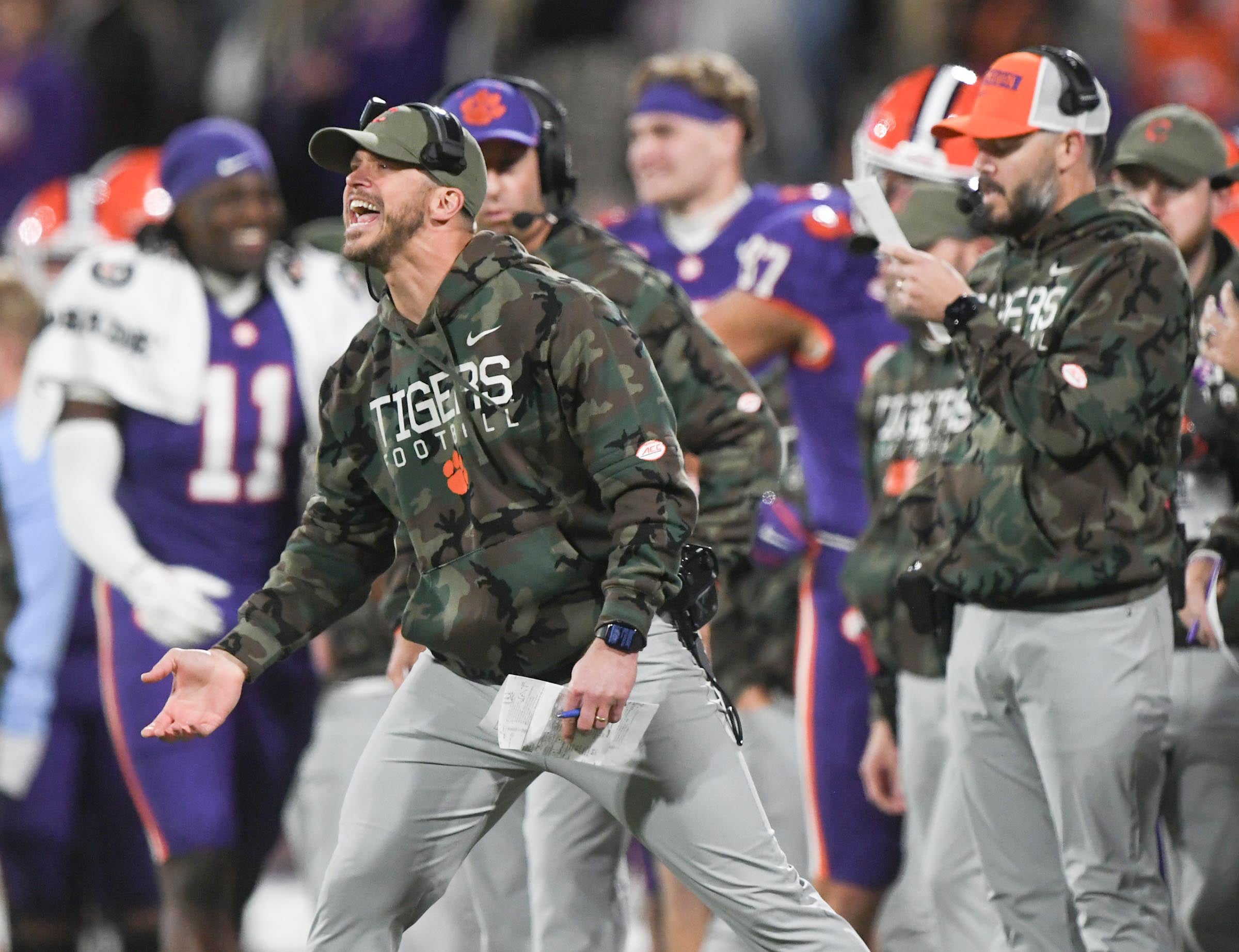 Clemson Tigers wide receiver coach Tyler Grisham communicates during a game against The Citadel Bulldogs at Memorial Stadium.