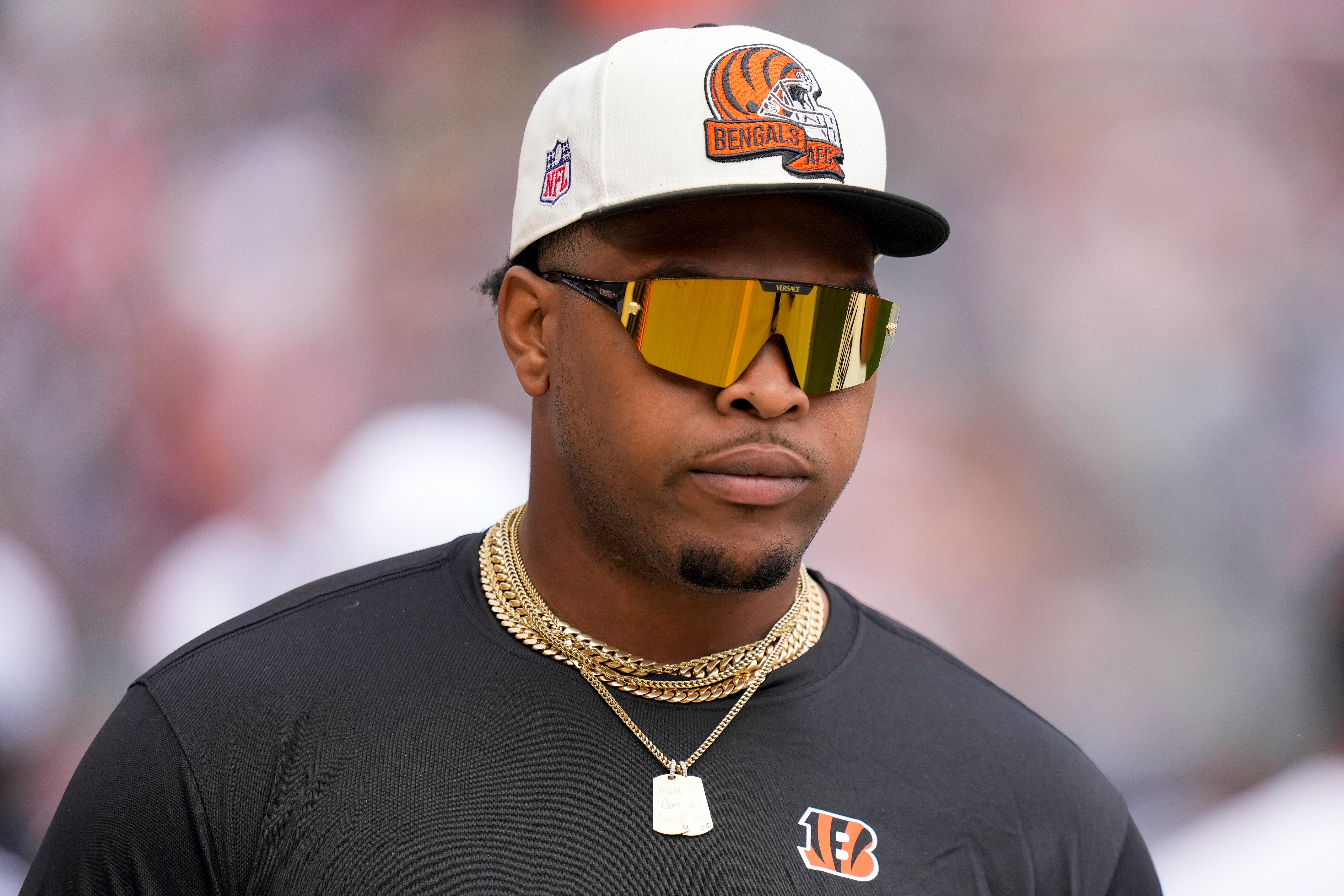 Aug 17, 2024; Chicago, Illinois, USA; Cincinnati Bengals offensive tackle Orlando Brown Jr. (75) walks the sideline during the first quarter of the NFL Preseason Week 2 game between the Chicago Bears and the Cincinnati Bengals at Soldier Field.