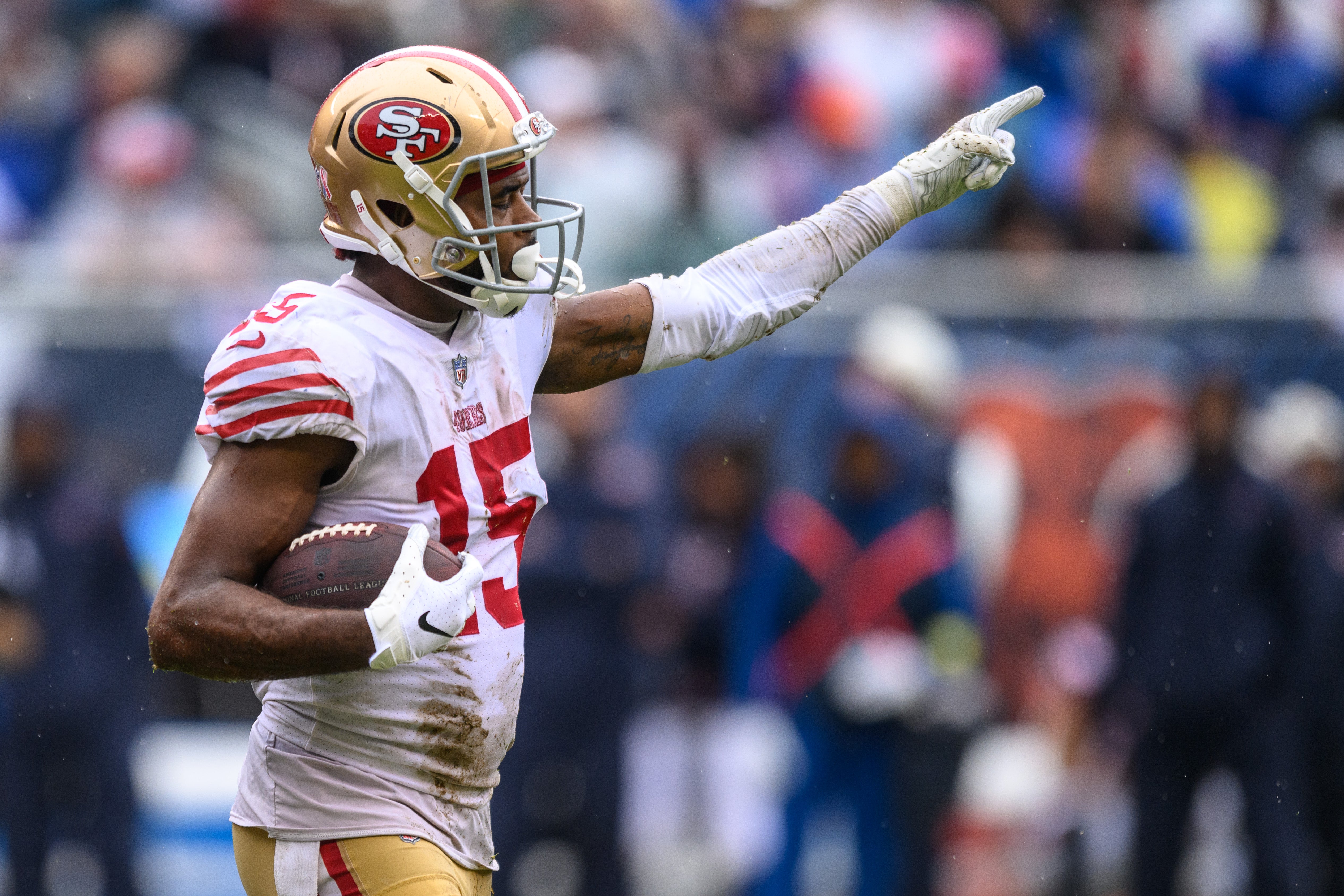 San Francisco 49ers wide receiver Jauan Jennings (15) signals first down in the third quarter against the Chicago Bears at Soldier Field.