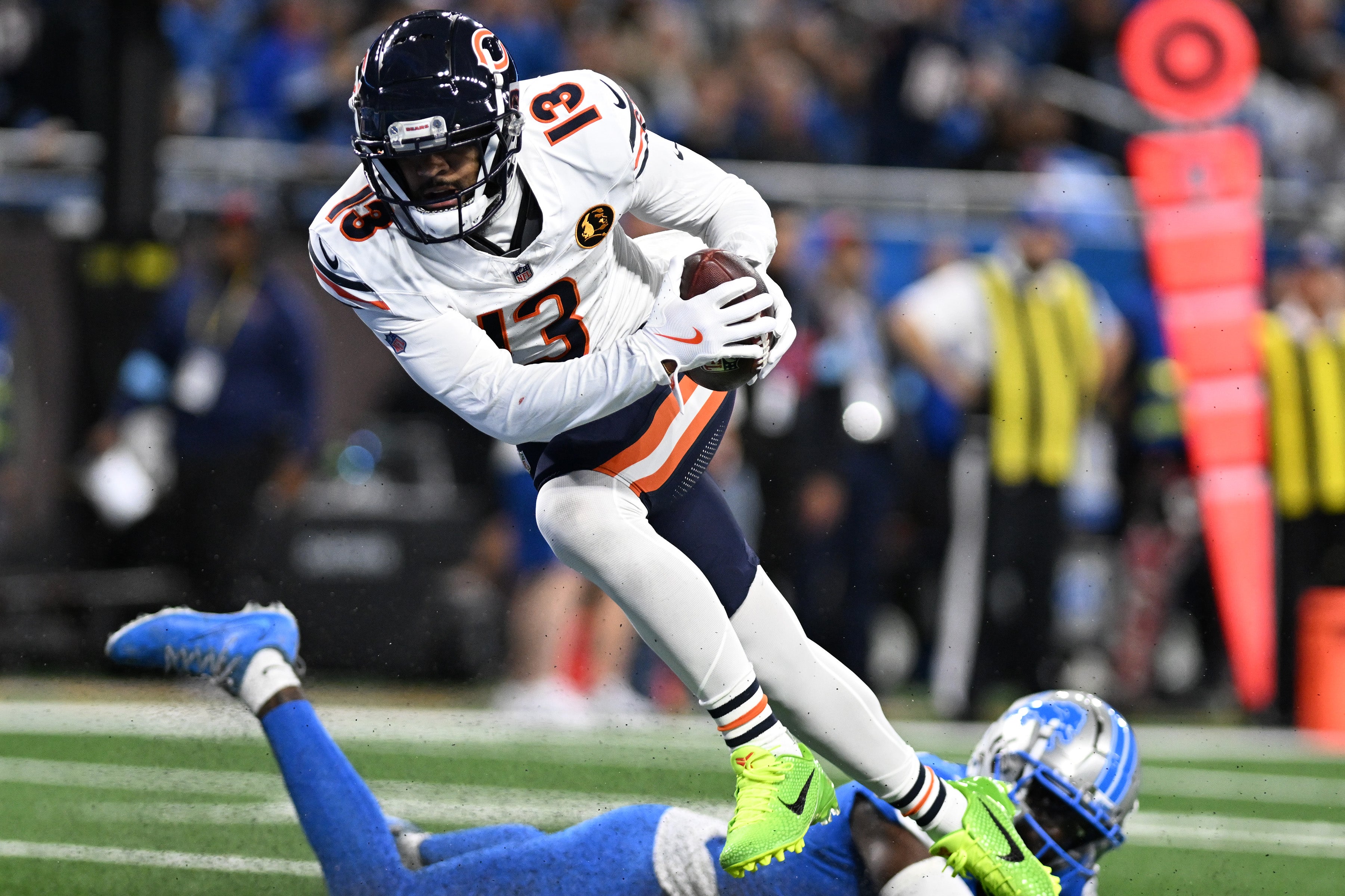 Nov 28, 2024; Detroit, Michigan, USA; Chicago Bears wide receiver Keenan Allen (13) catches a touchdown pass against the Detroit Lions in the third quarter at Ford Field.