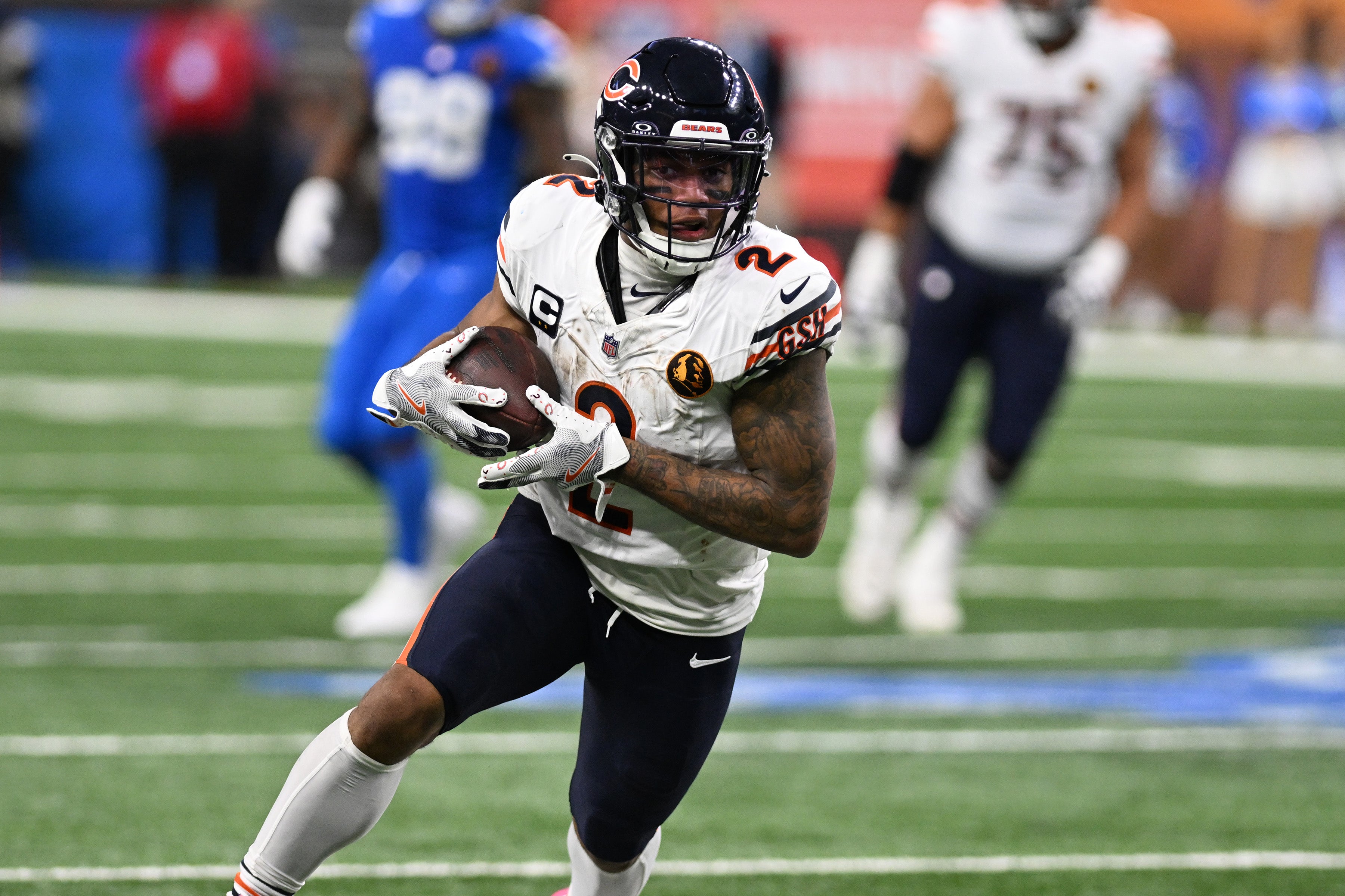 Nov 28, 2024; Detroit, Michigan, USA; Chicago Bears wide receiver DJ Moore (2) heads upfield after catching a pass against the Detroit Lions in the fourth quarter at Ford Field.