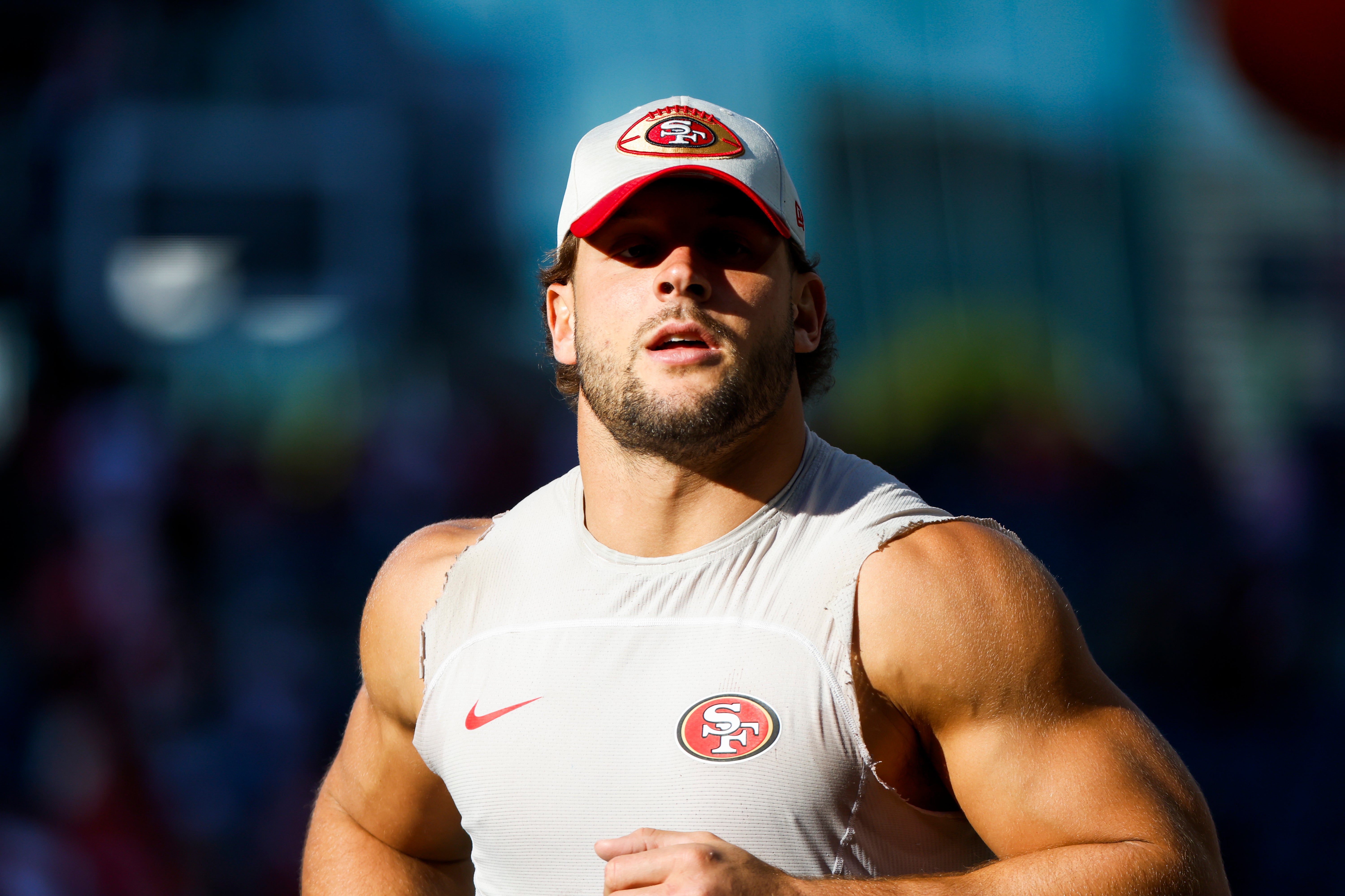 San Francisco 49ers defensive end Nick Bosa (97) returns to the locker room following early pregame warmups against the Seattle Seahawks at Lumen Field.