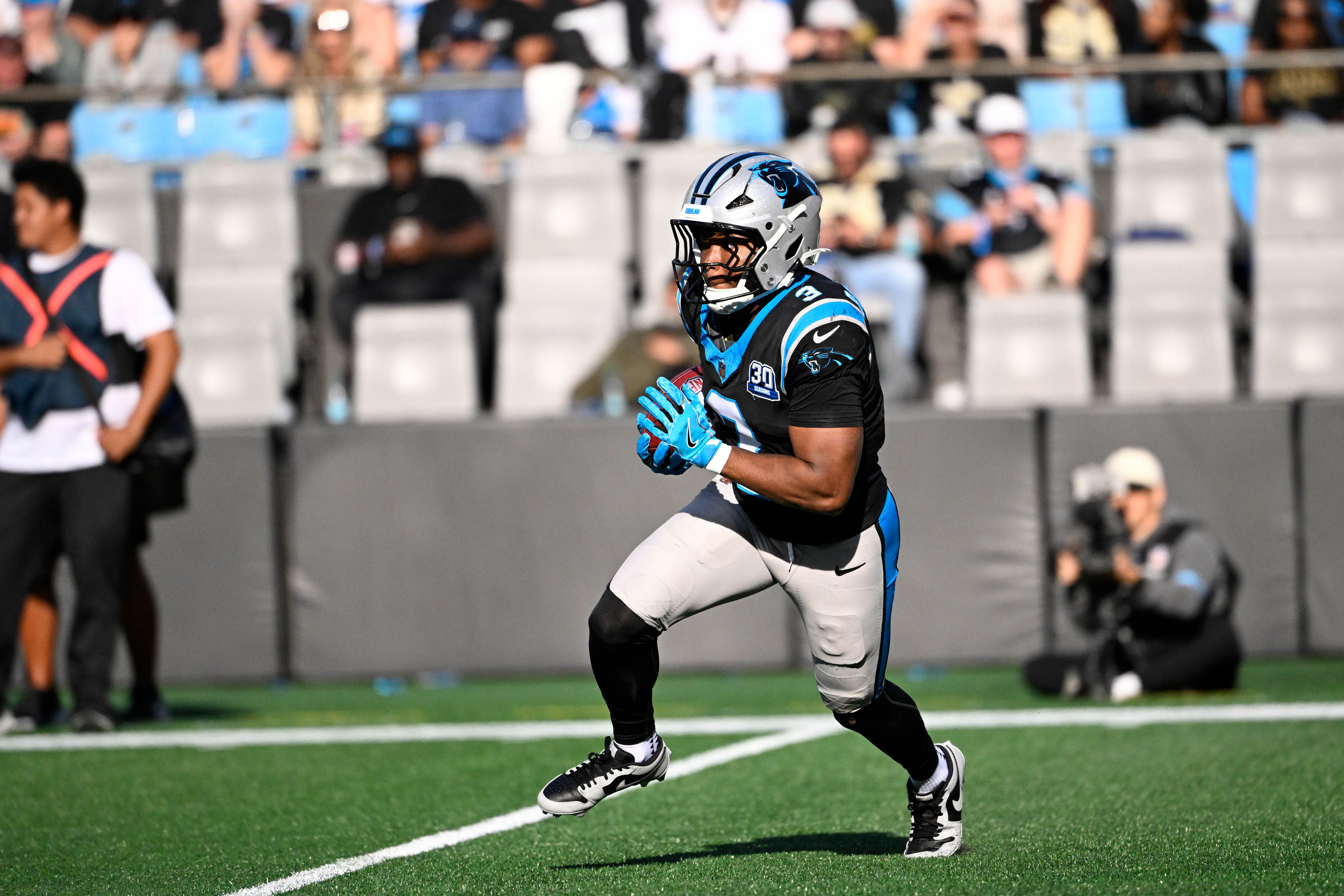 Panthers running back Raheem Blackshear returns a punt