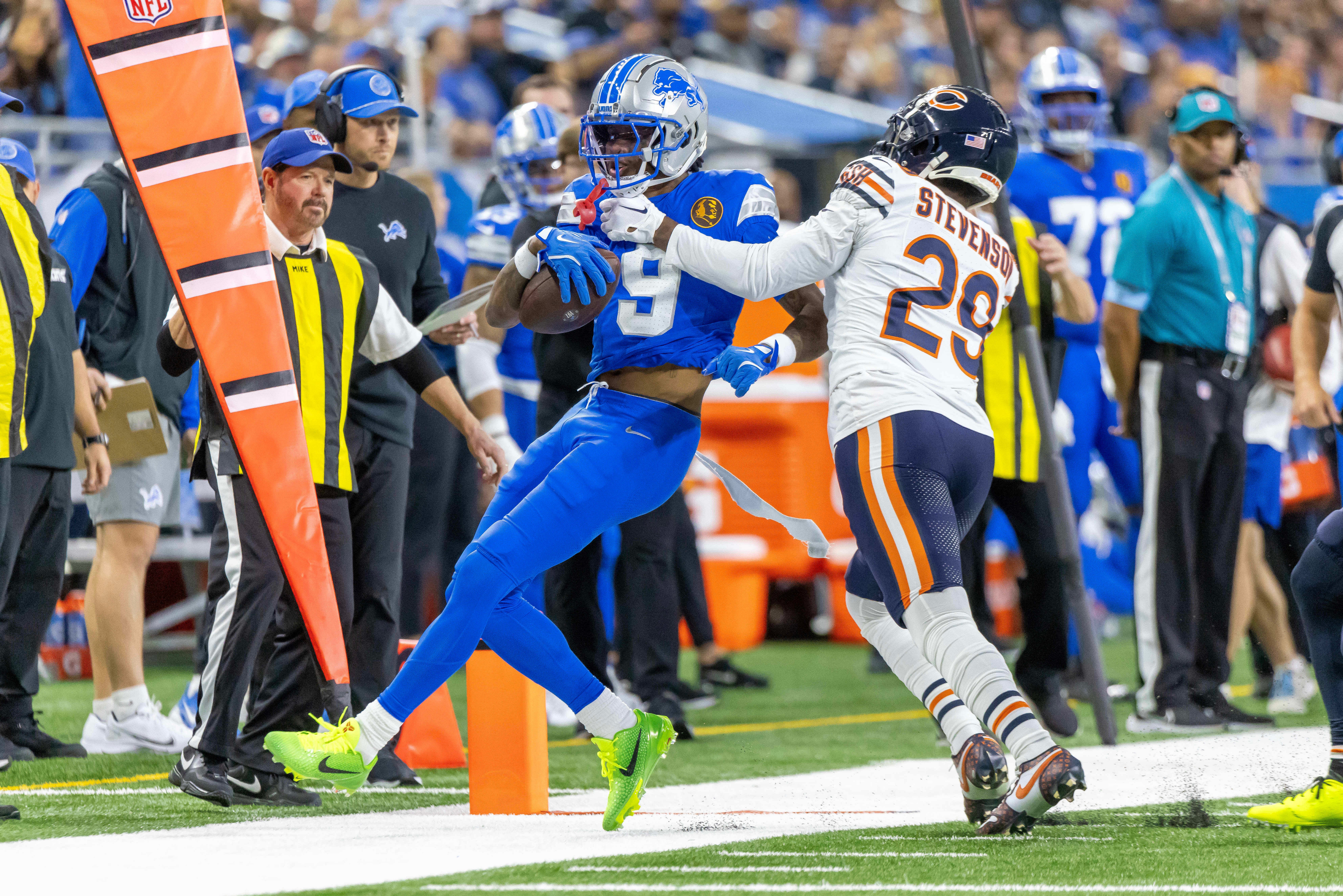 Nov 28, 2024; Detroit, Michigan, USA; Detroit Lions wide receiver Jameson Williams (9) is pushed out of bounds by Chicago Bears cornerback Tyrique Stevenson (29) during the first half at Ford Field.