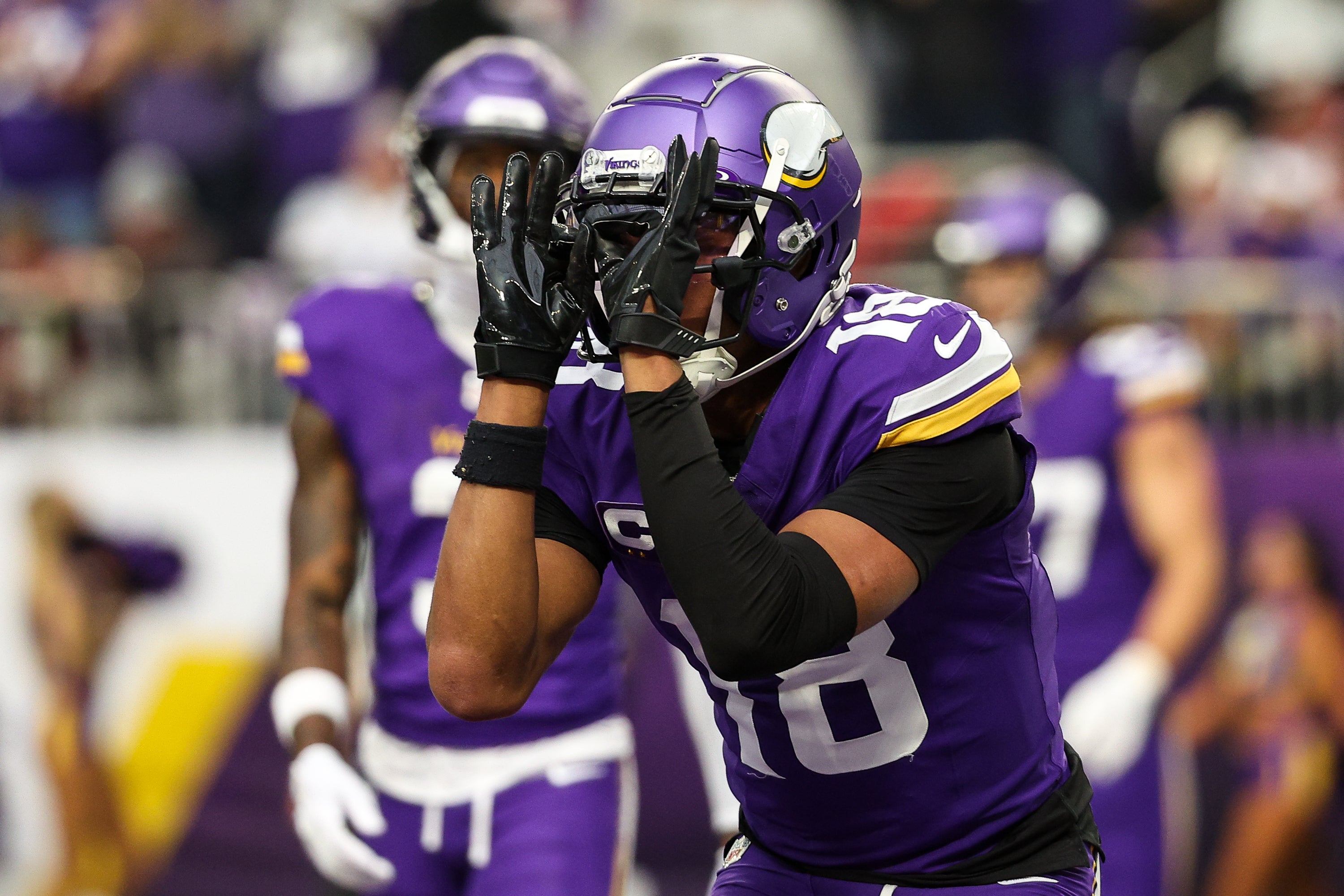 Dec 8, 2024; Minneapolis, Minnesota, USA; Minnesota Vikings wide receiver Justin Jefferson (18) celebrates his touchdown against the Atlanta Falcons during the second quarter at U.S. Bank Stadium.