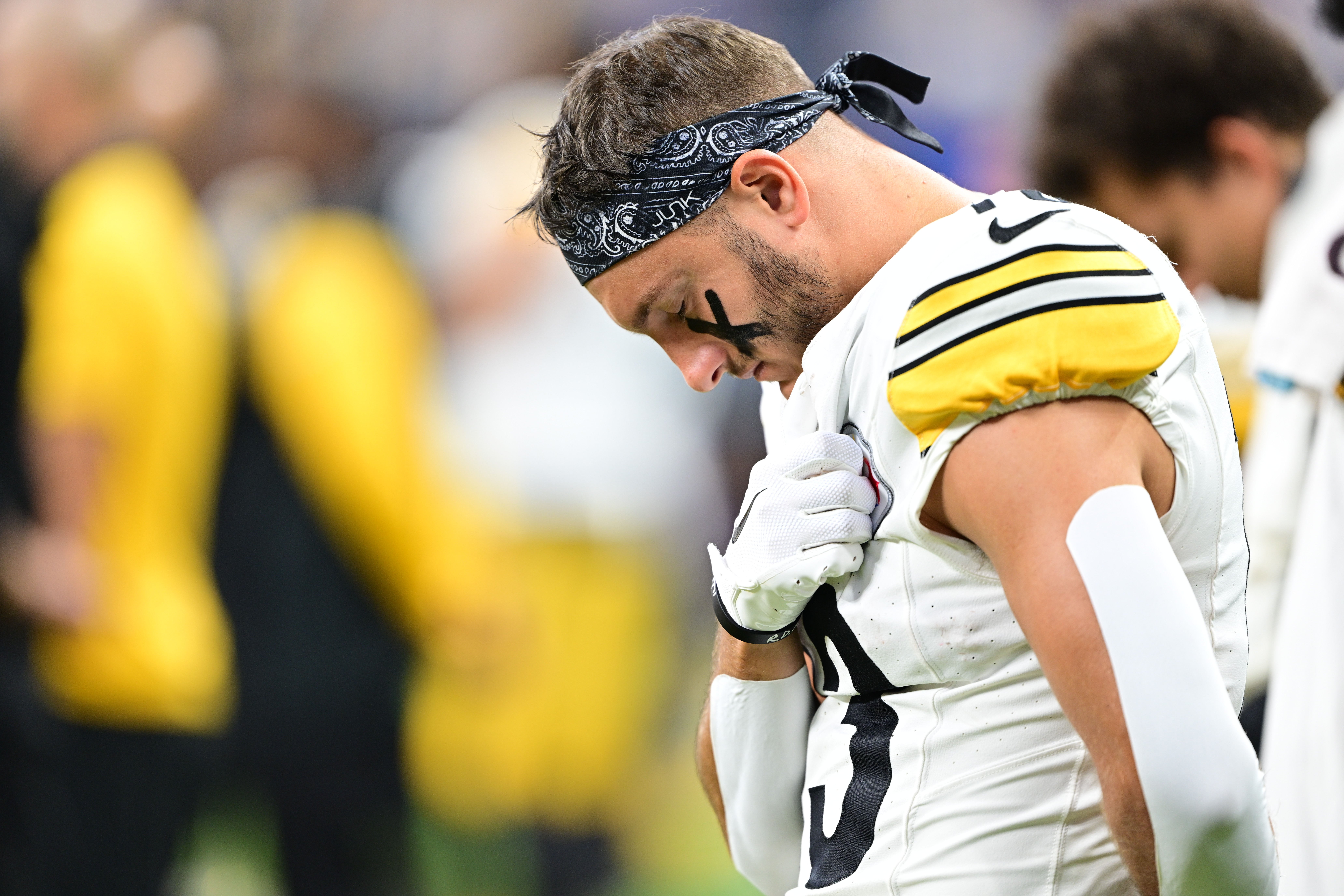Sep 29, 2024; Indianapolis, Indiana, USA; Pittsburgh Steelers wide receiver Scotty Miller (13) bows his head during the national anthem before the game against the Indianapolis Colts at Lucas Oil Stadium.