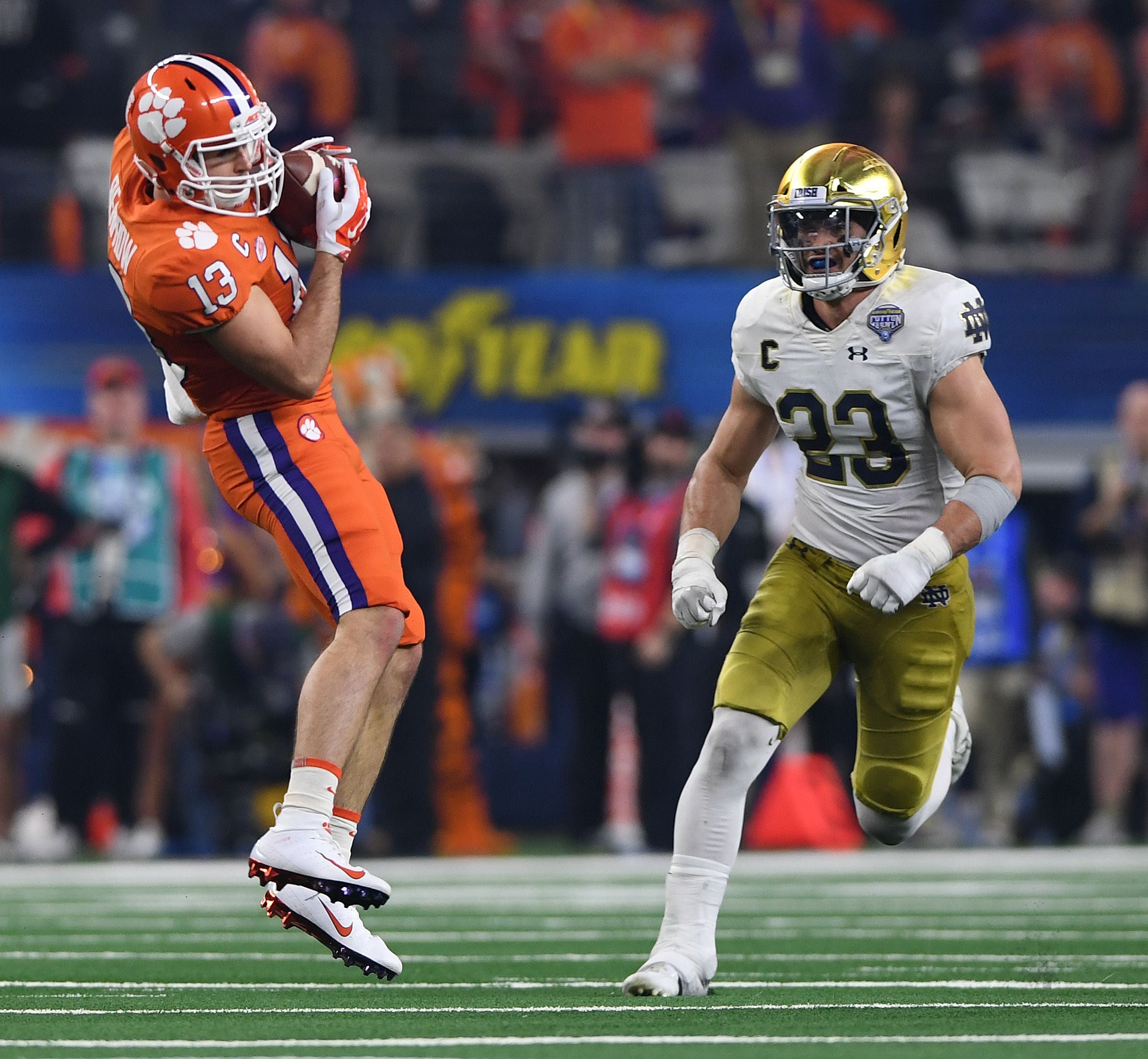 Clemson wide receiver Hunter Renfrow (13) catches a pass past Notre Dame linebacker Drue Tranquill (23) during the 2nd quarter of the Goodyear Cotton Bowl at AT&T stadium in Arlington, TX Saturday, December 29, 2018. Clemson Notre Dame Goodyear Cotton Bowl
