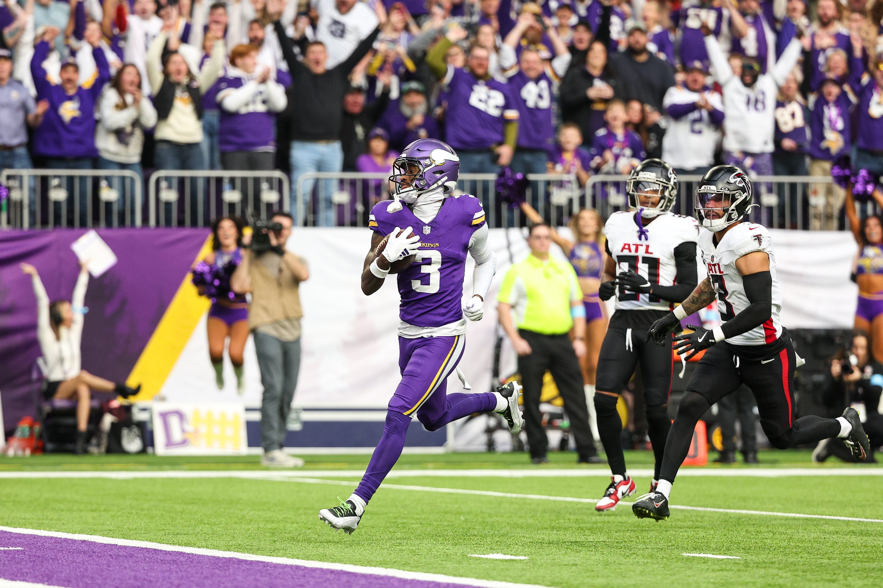 Dec 8, 2024; Minneapolis, Minnesota, USA; Minnesota Vikings wide receiver Jordan Addison (3) catches a pass for a touchdown against the Atlanta Falcons during the first quarter at U.S. Bank Stadium.
